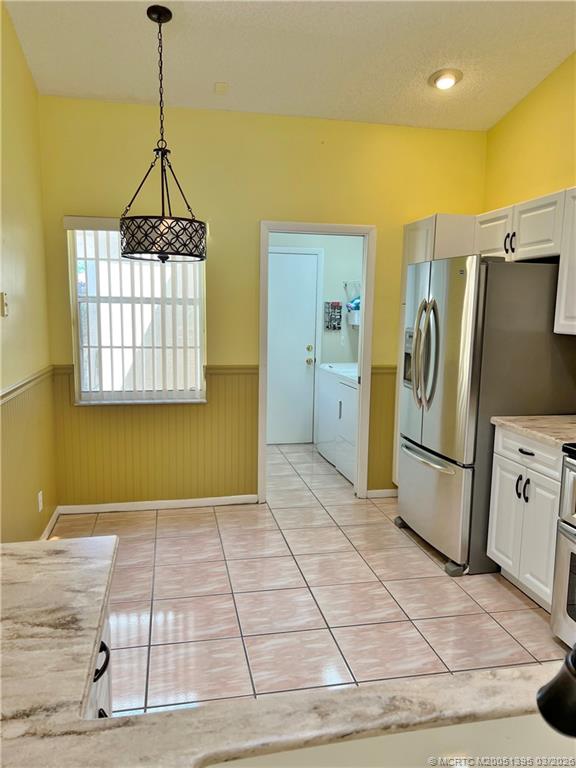 3903 SW Whispering Sound Drive