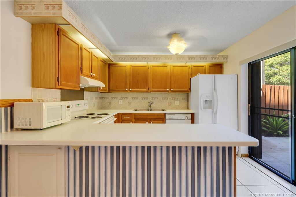 5662 SE Windsong Lane 408