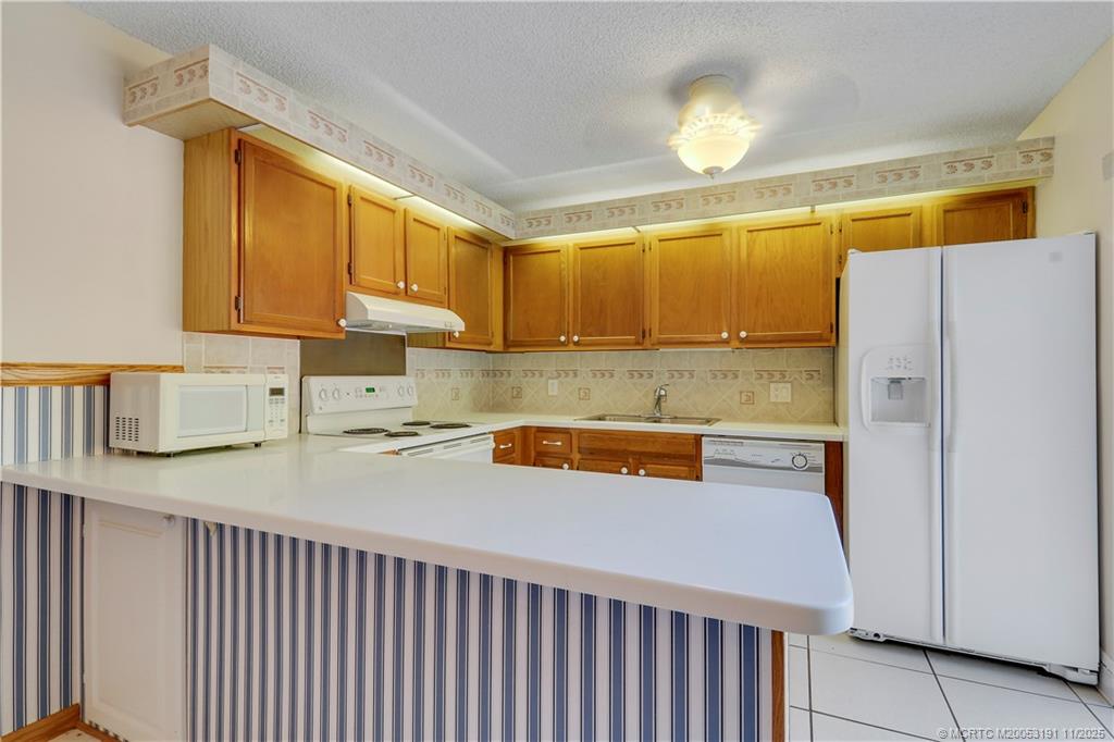 5662 SE Windsong Lane 408