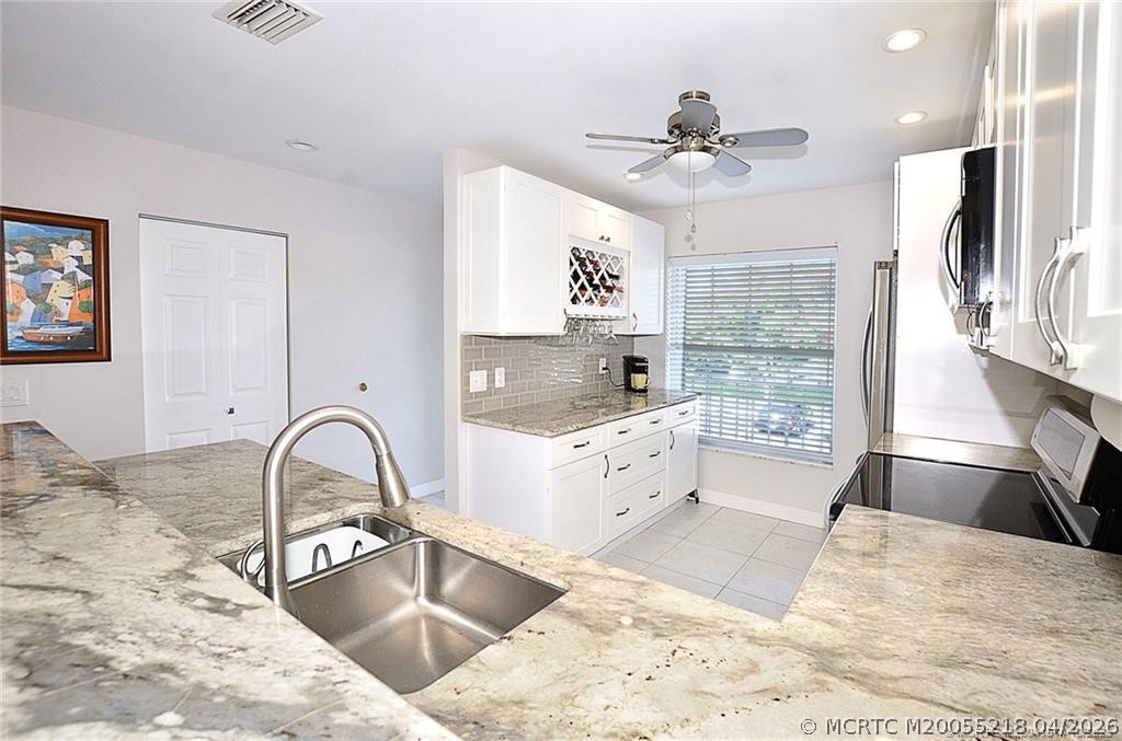 1854 SW Palm City Road 203