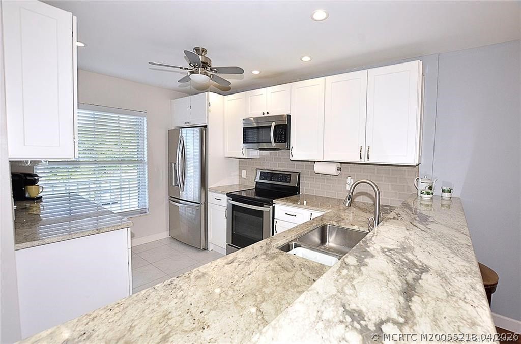 1854 SW Palm City Road 203