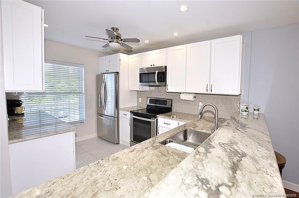 1854 SW Palm City Road 203