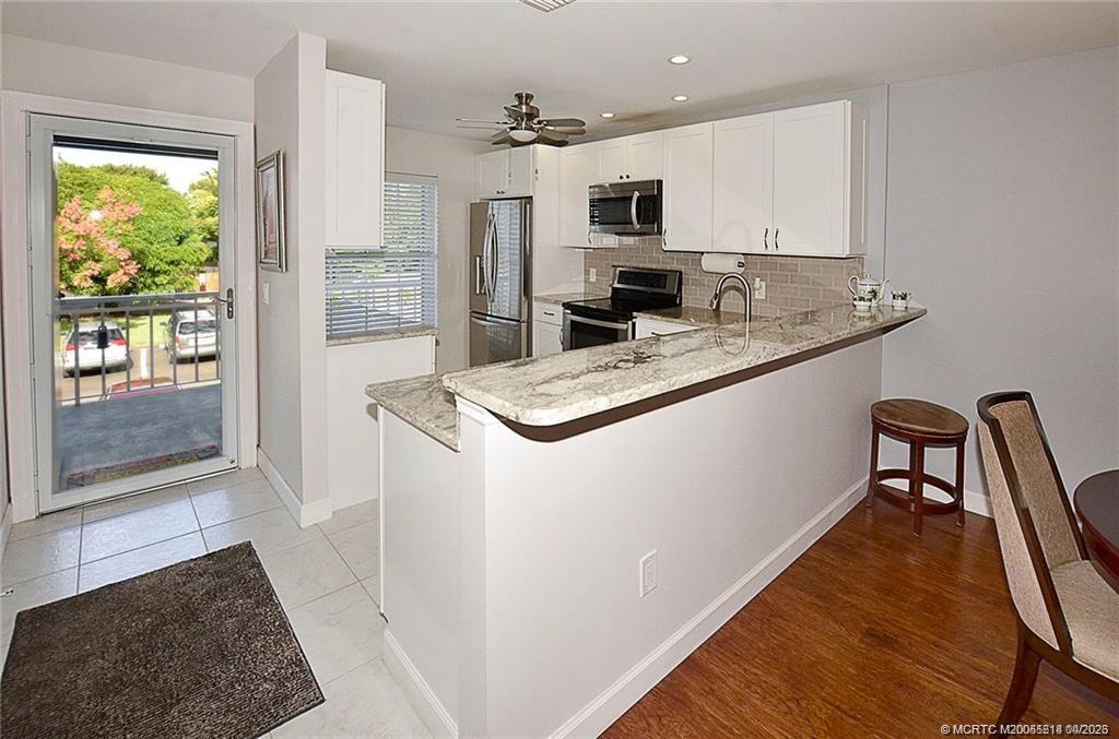 1854 SW Palm City Road 203