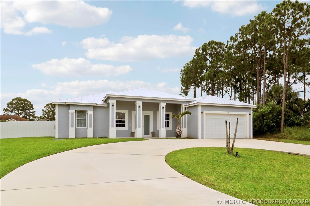 6216 NW West Deville Circle