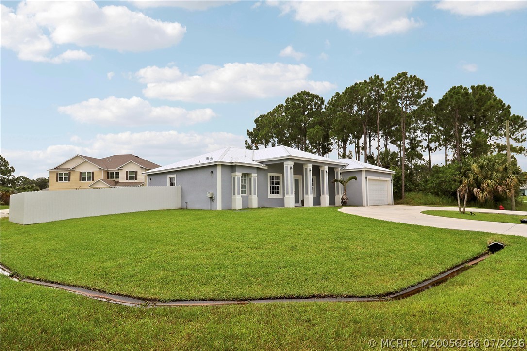 6216 NW West Deville Circle