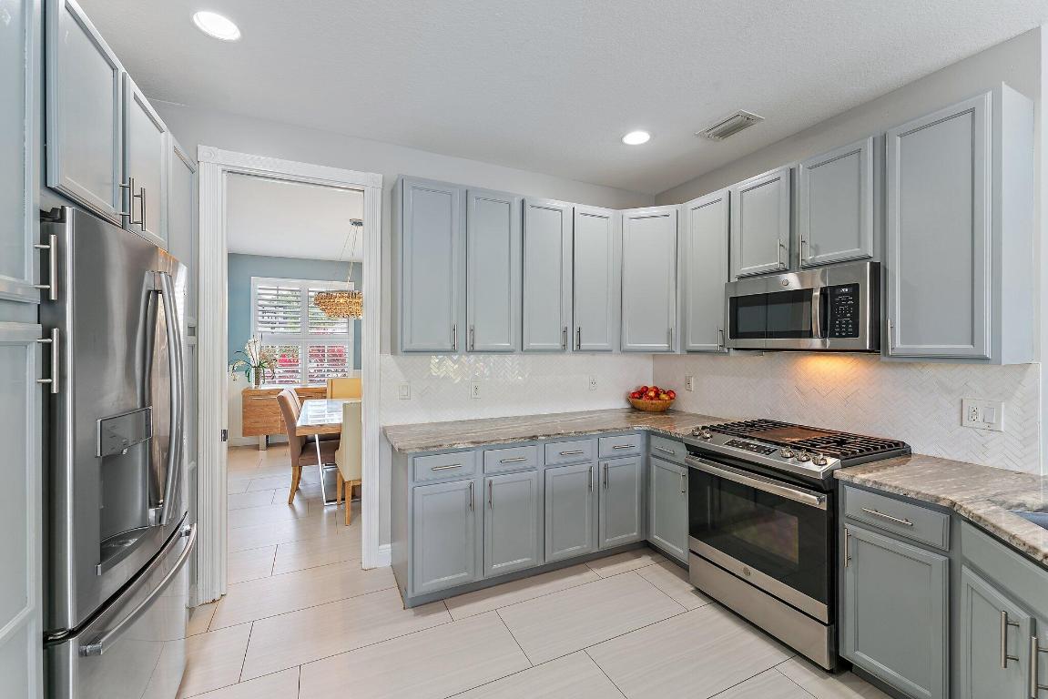 573 E Cocoplum Drive E