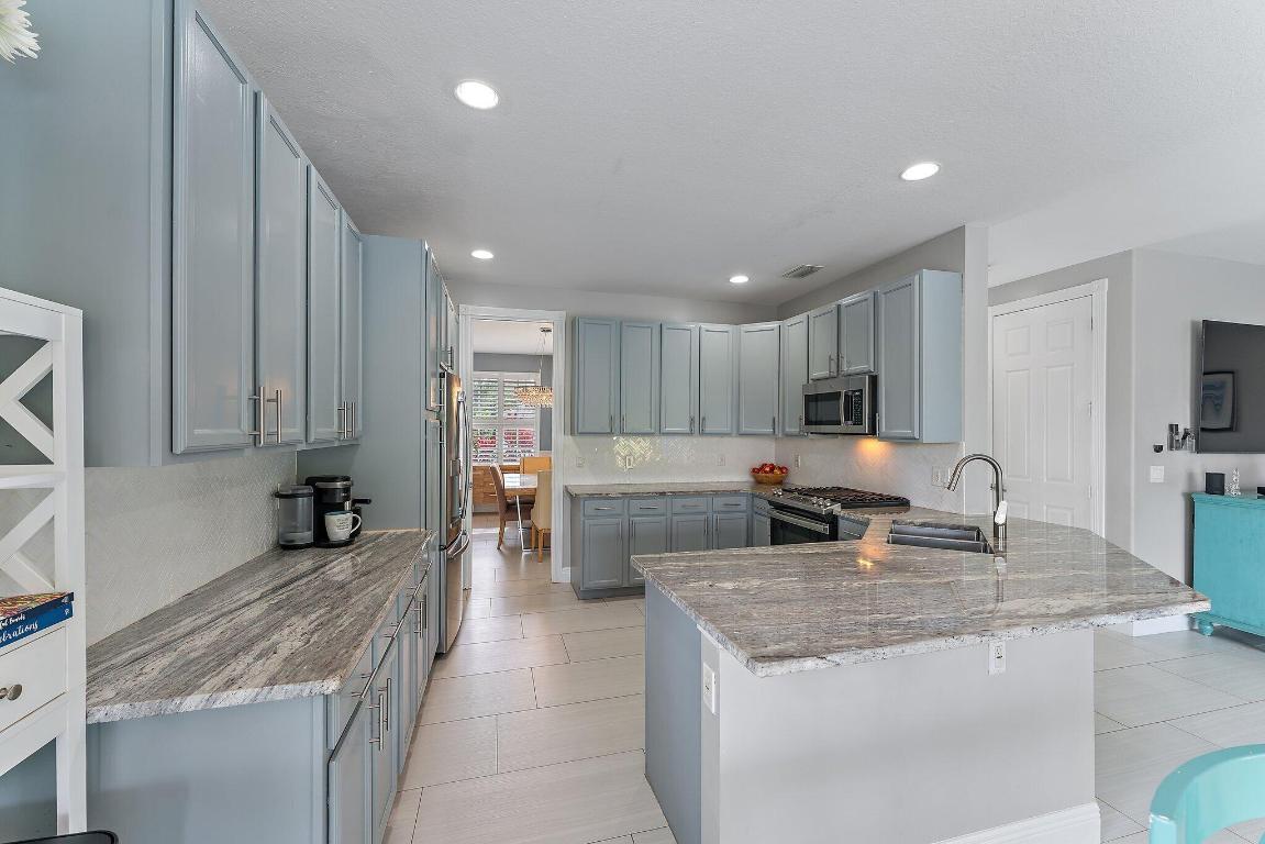 573 E Cocoplum Drive E