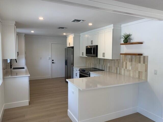 127 W Riverside Drive