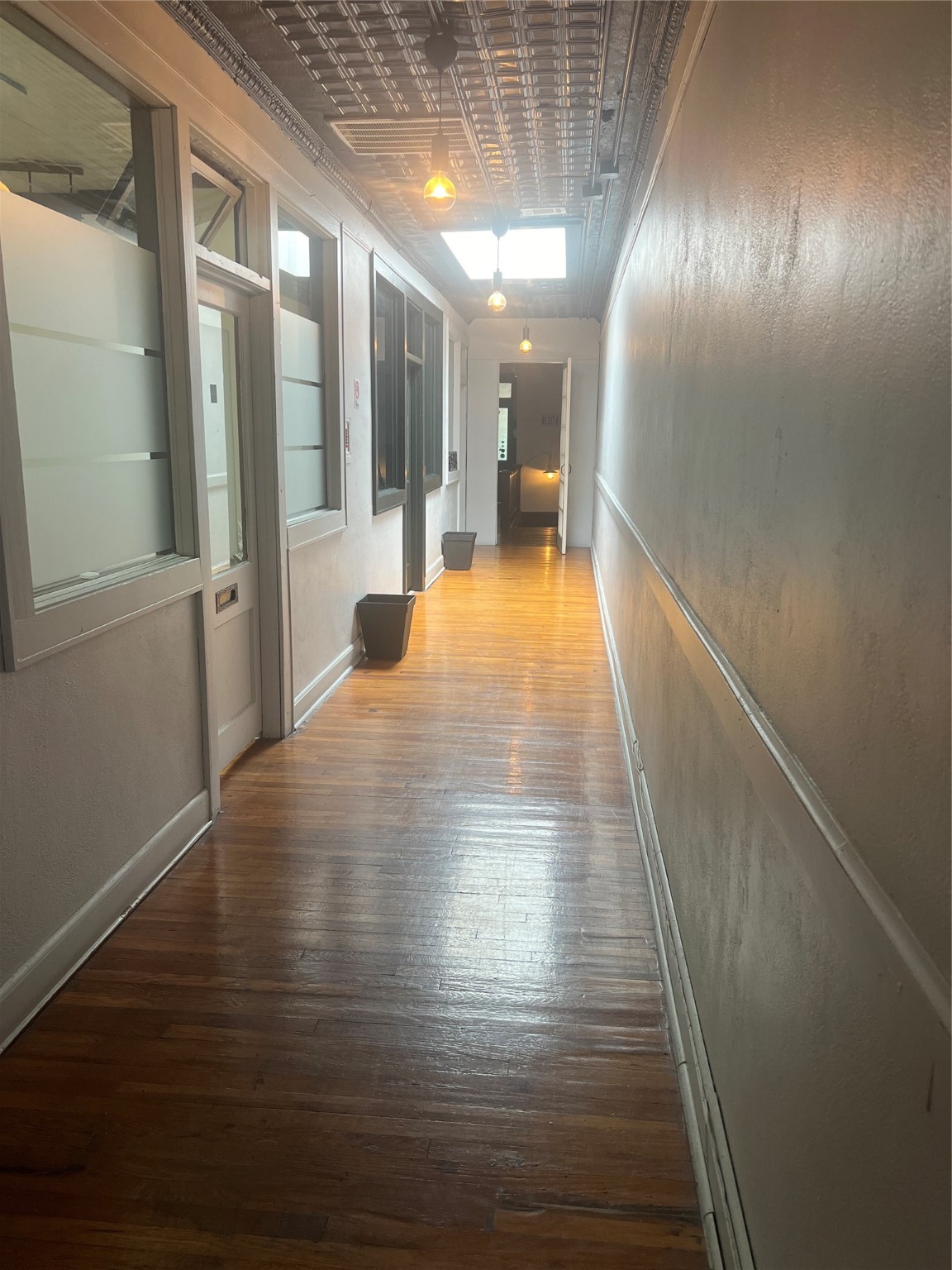 100 E Louisiana Street 1