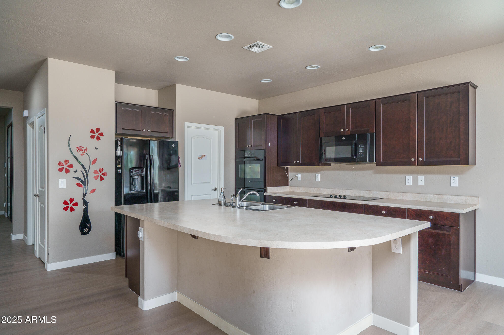 10217 W MARGUERITE Avenue