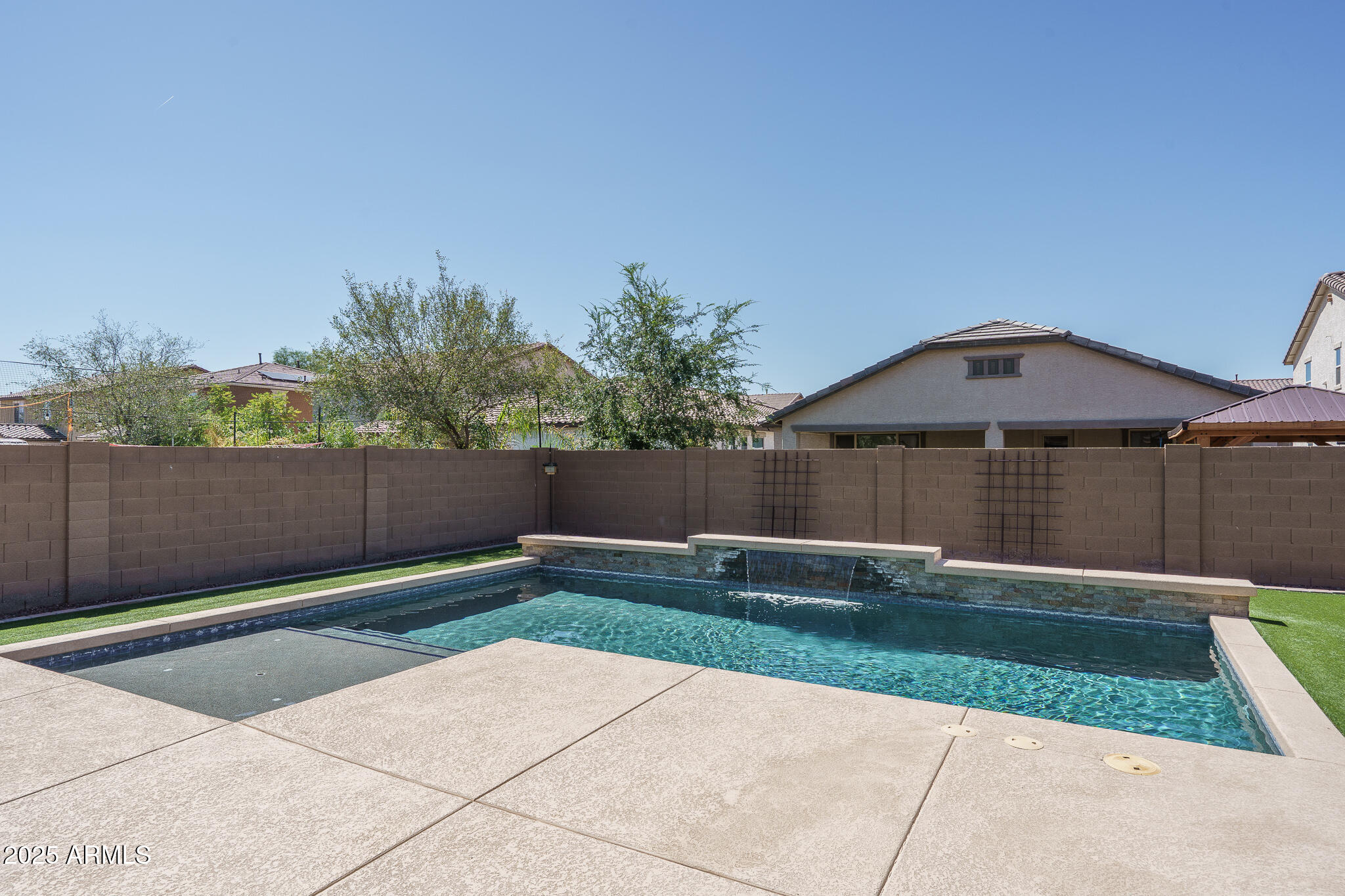 10217 W MARGUERITE Avenue