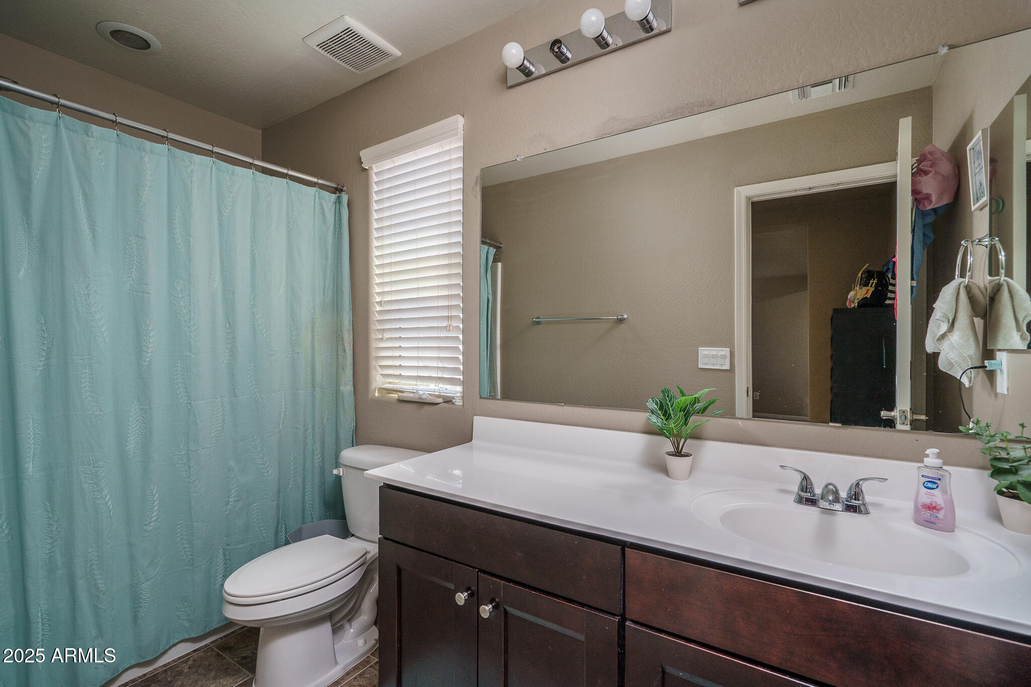 10217 W MARGUERITE Avenue