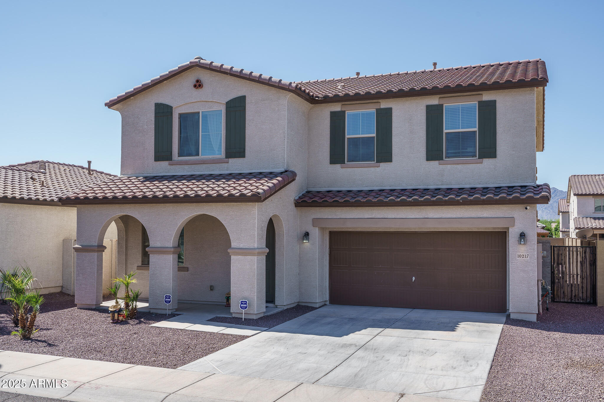 10217 W MARGUERITE Avenue