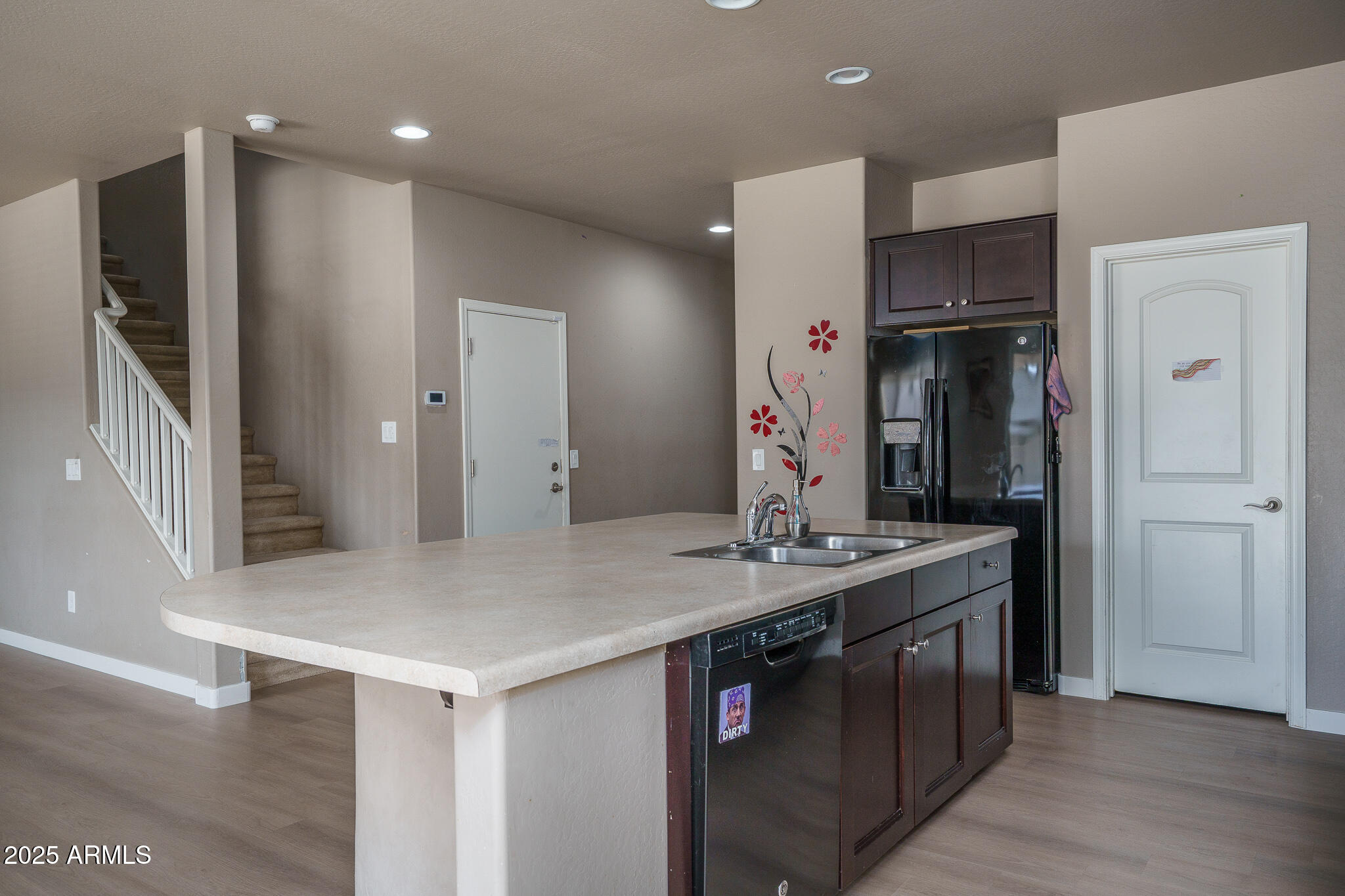 10217 W MARGUERITE Avenue