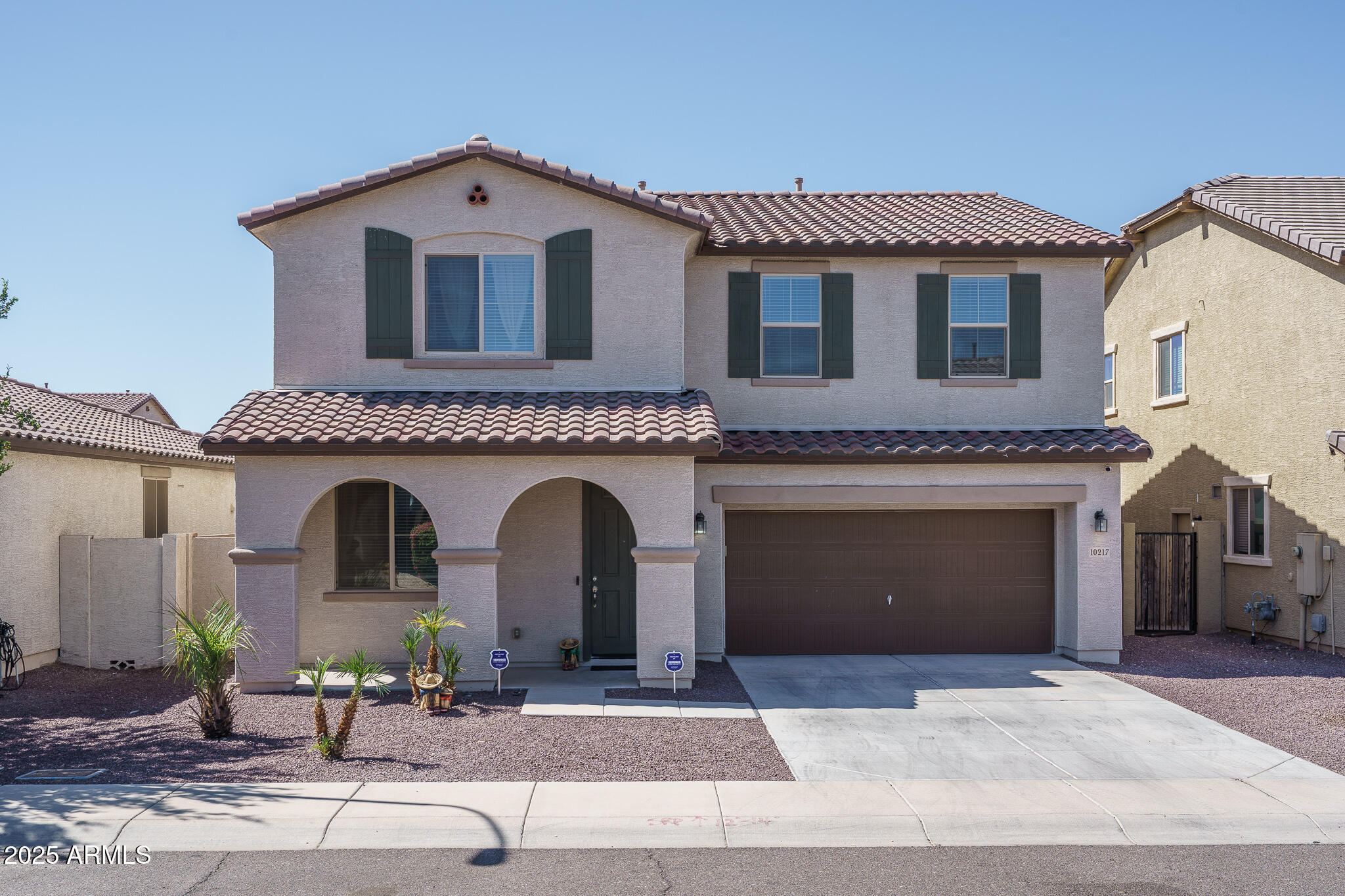 10217 W MARGUERITE Avenue