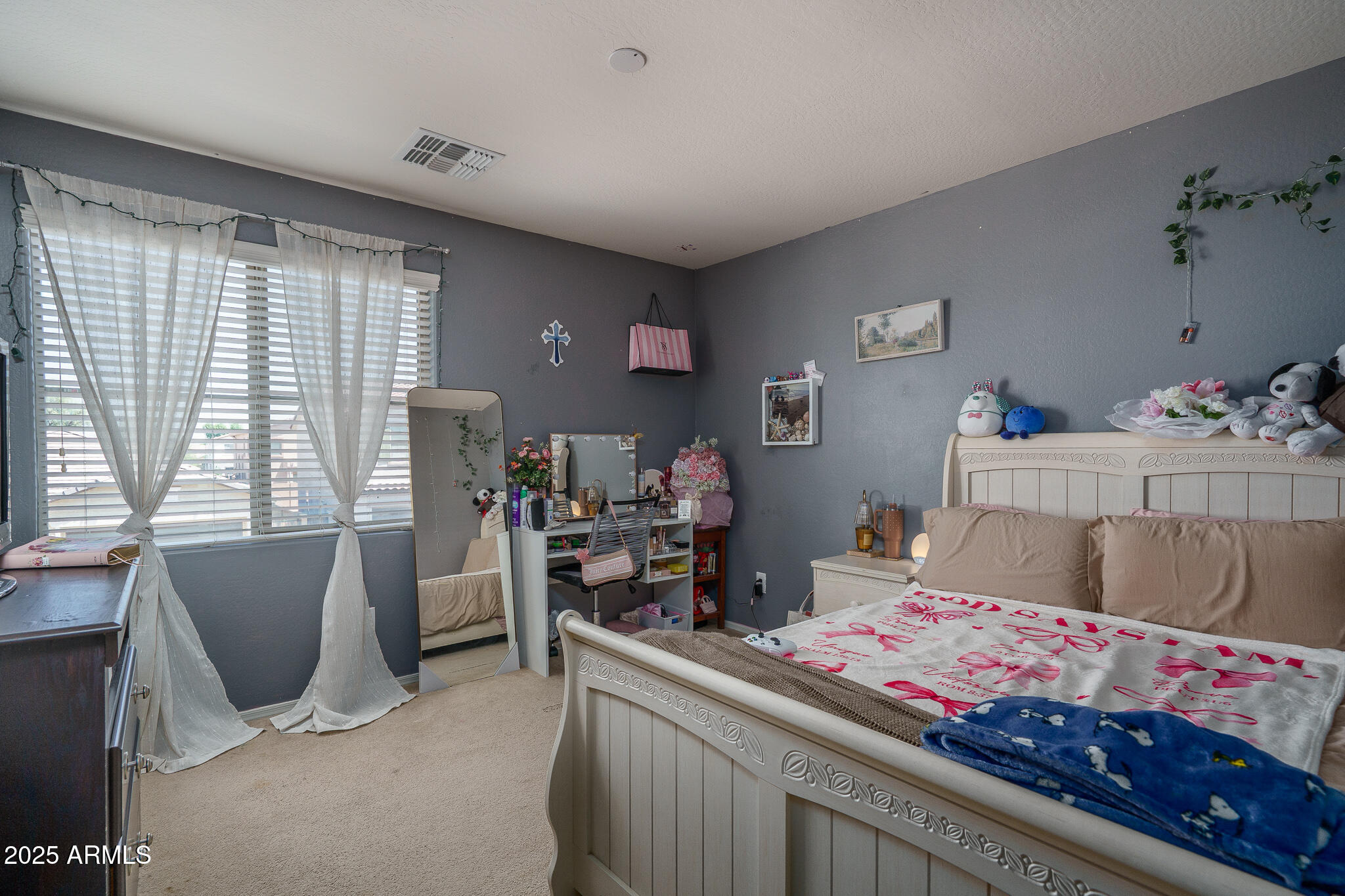 10217 W MARGUERITE Avenue