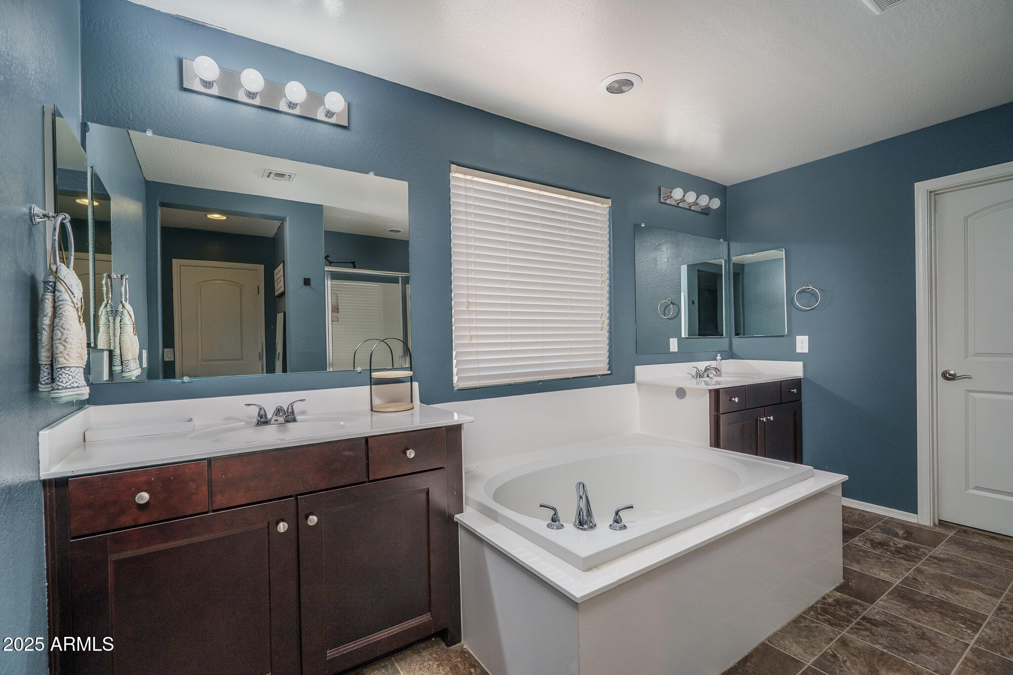 10217 W MARGUERITE Avenue