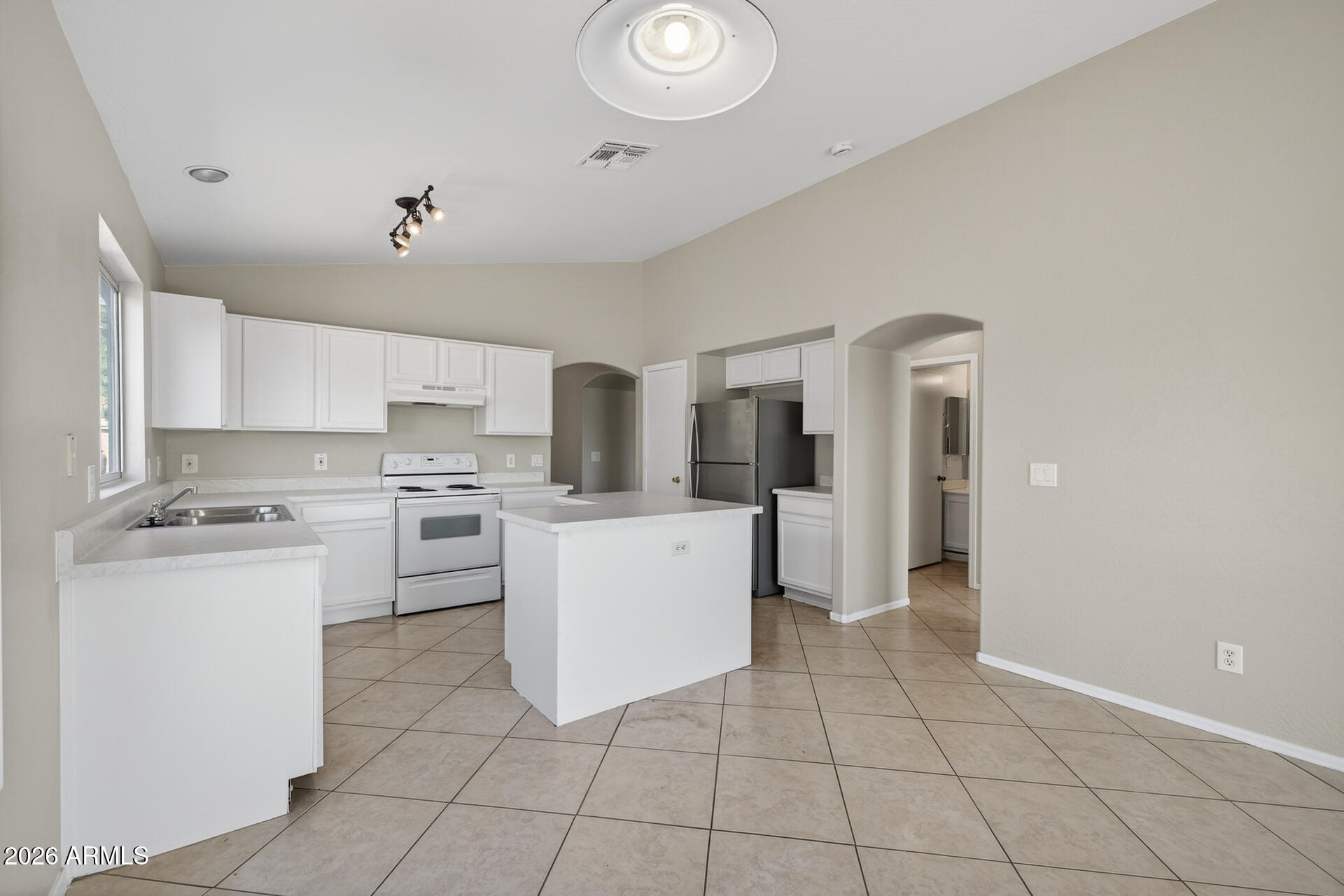 11921 W FLORES Drive