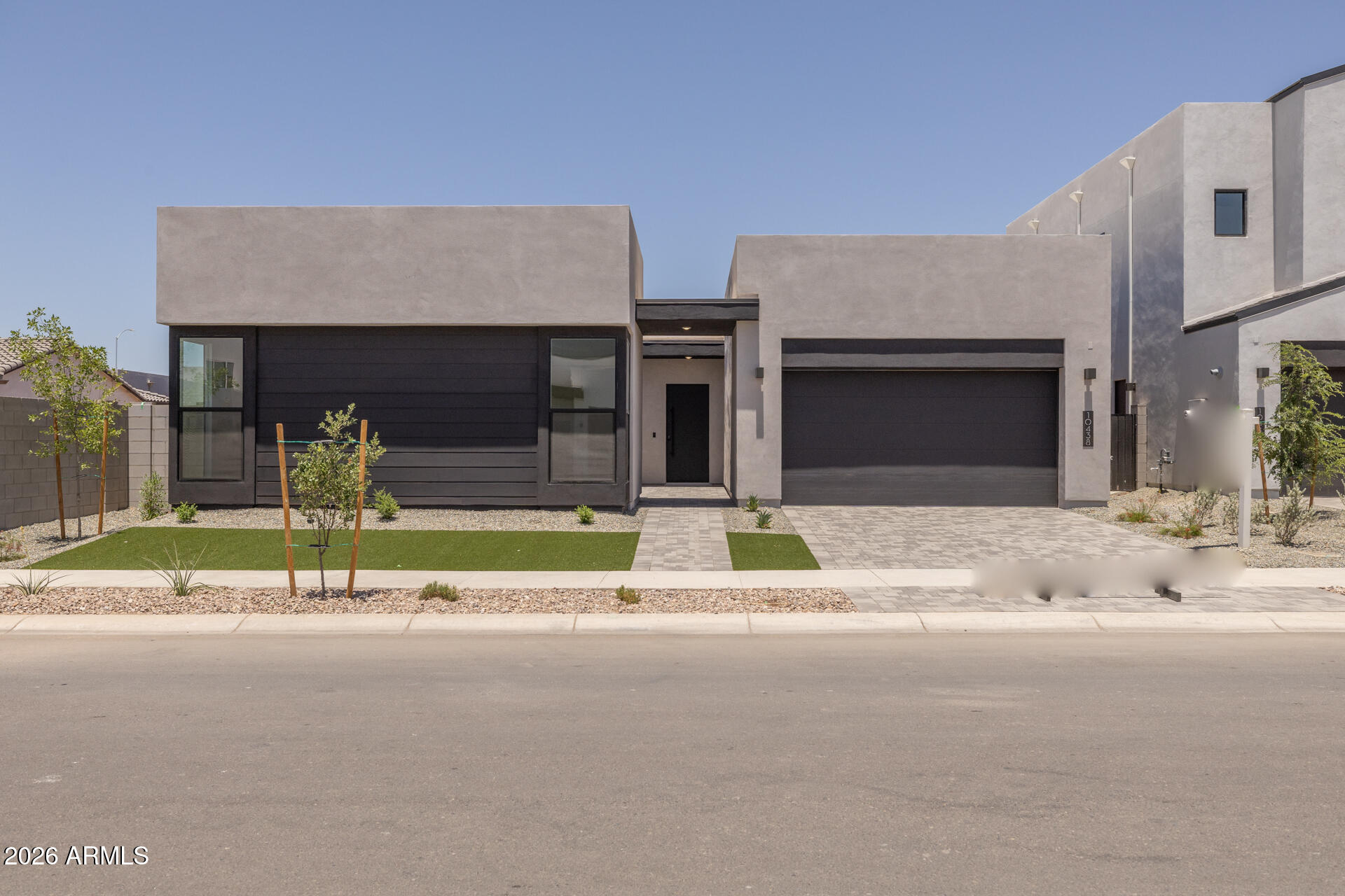 10438 E ULYSSES Avenue