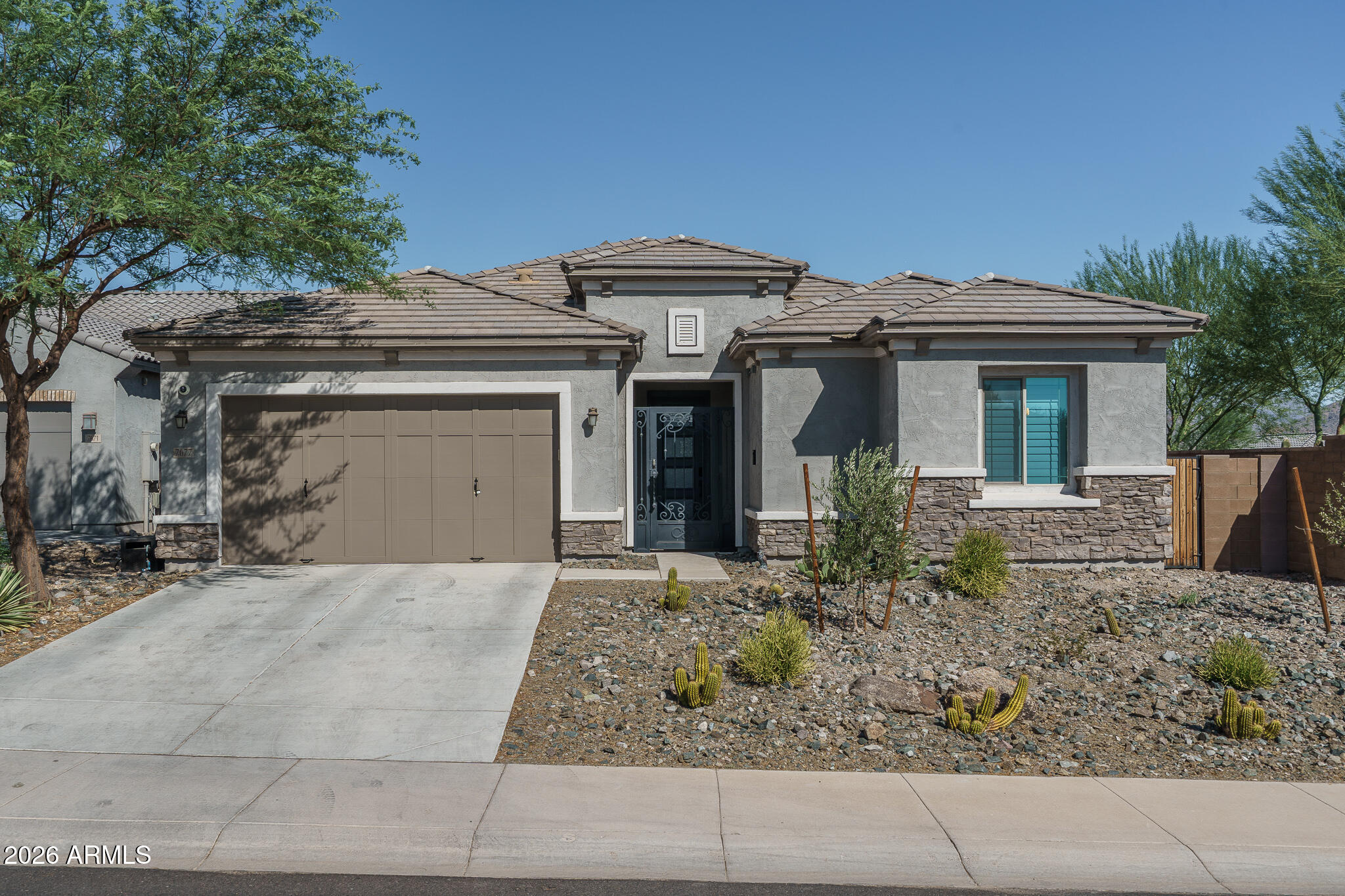 7677 S 164TH Lane