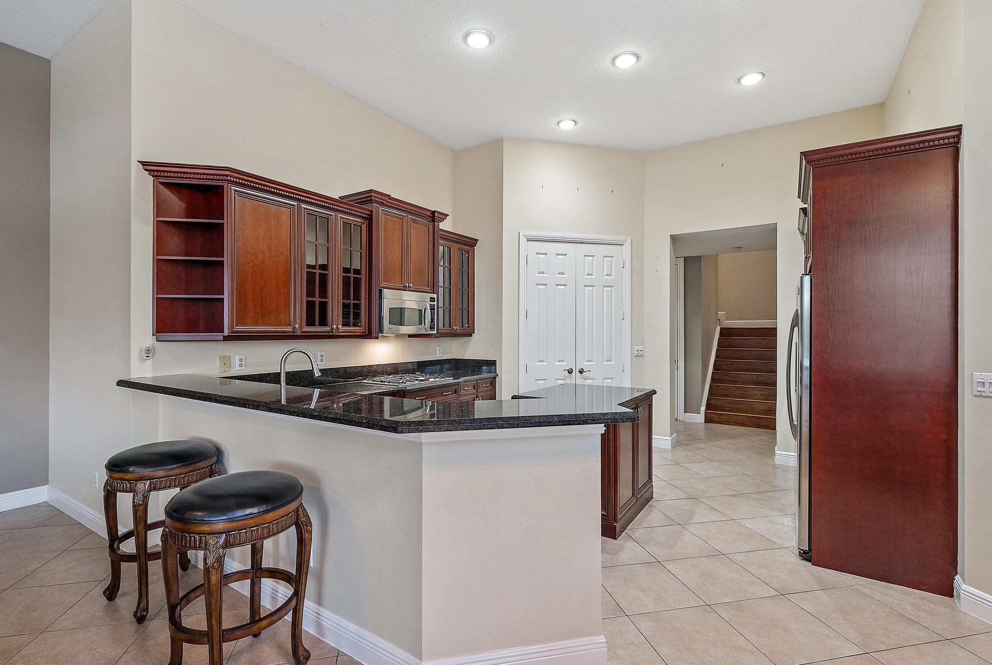 11801 SW Rossano Ln