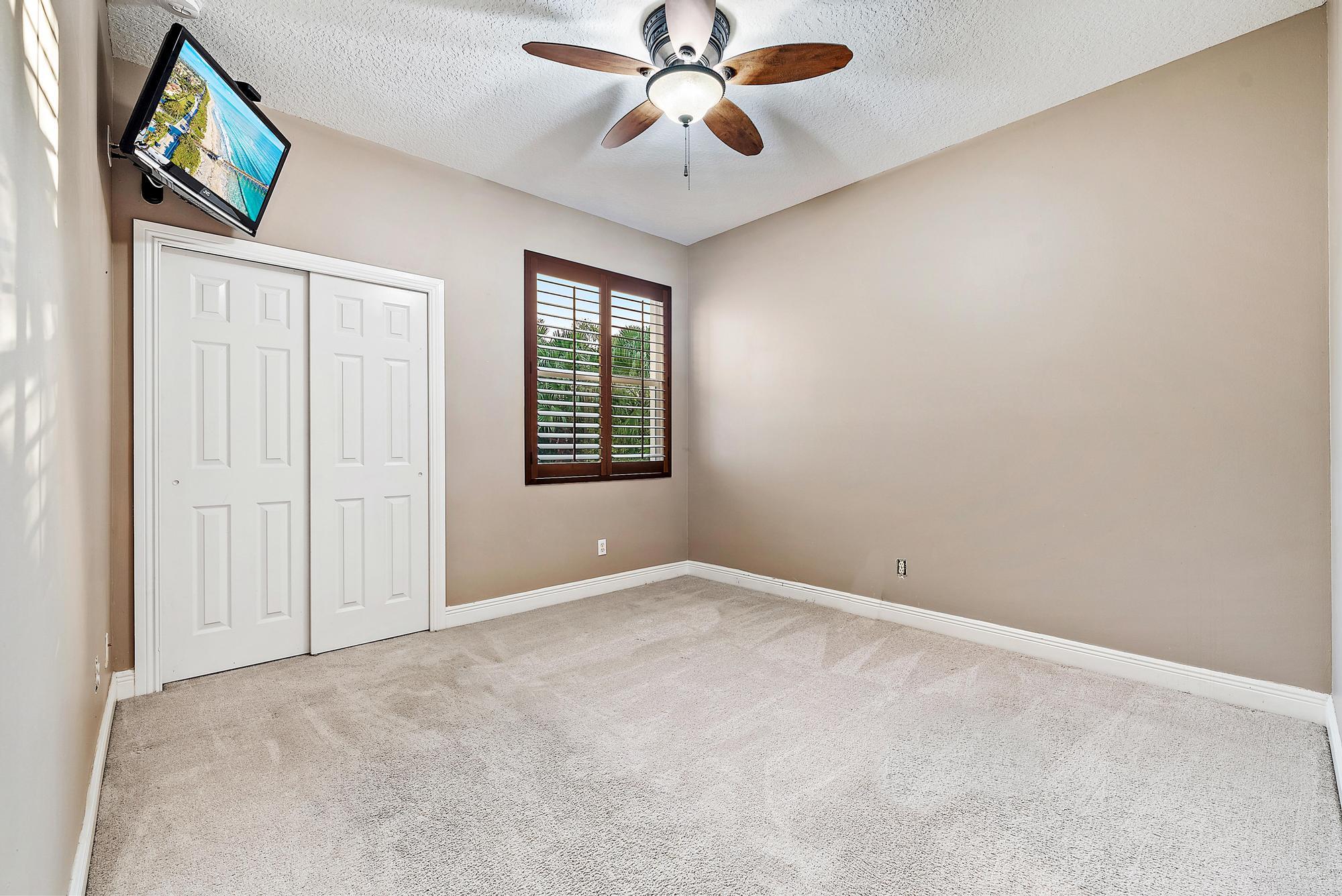 11801 SW Rossano Ln