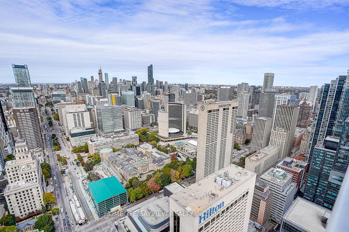 Aerial view of downtown Toronto, with the Sheraton hotel and CN Tower among the high-rises.