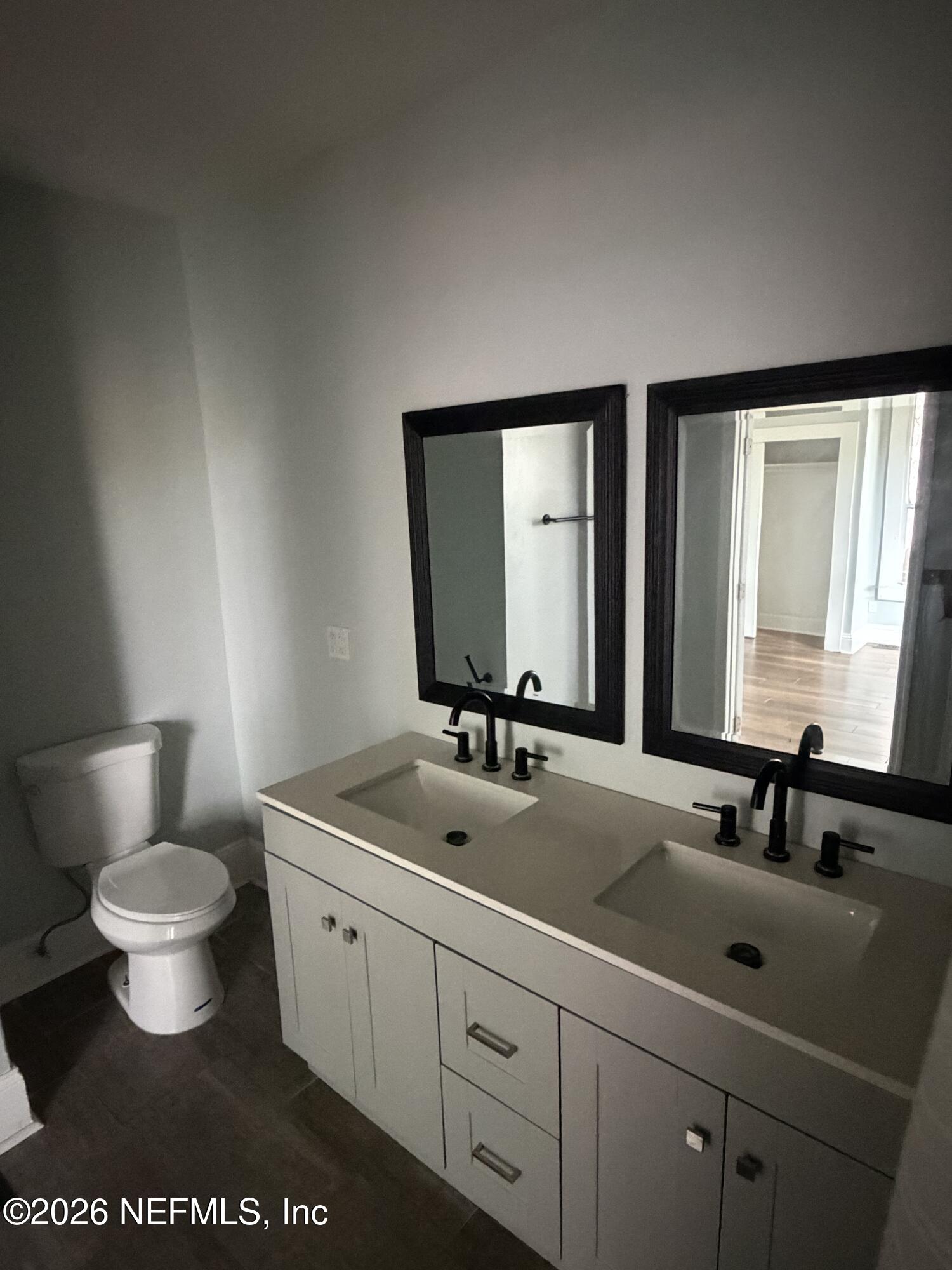 129 E 5TH Street
