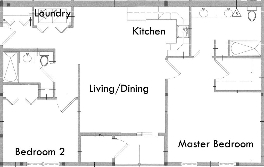 Floor plan showing two bedrooms, a living/dining area, kitchen, and laundry.