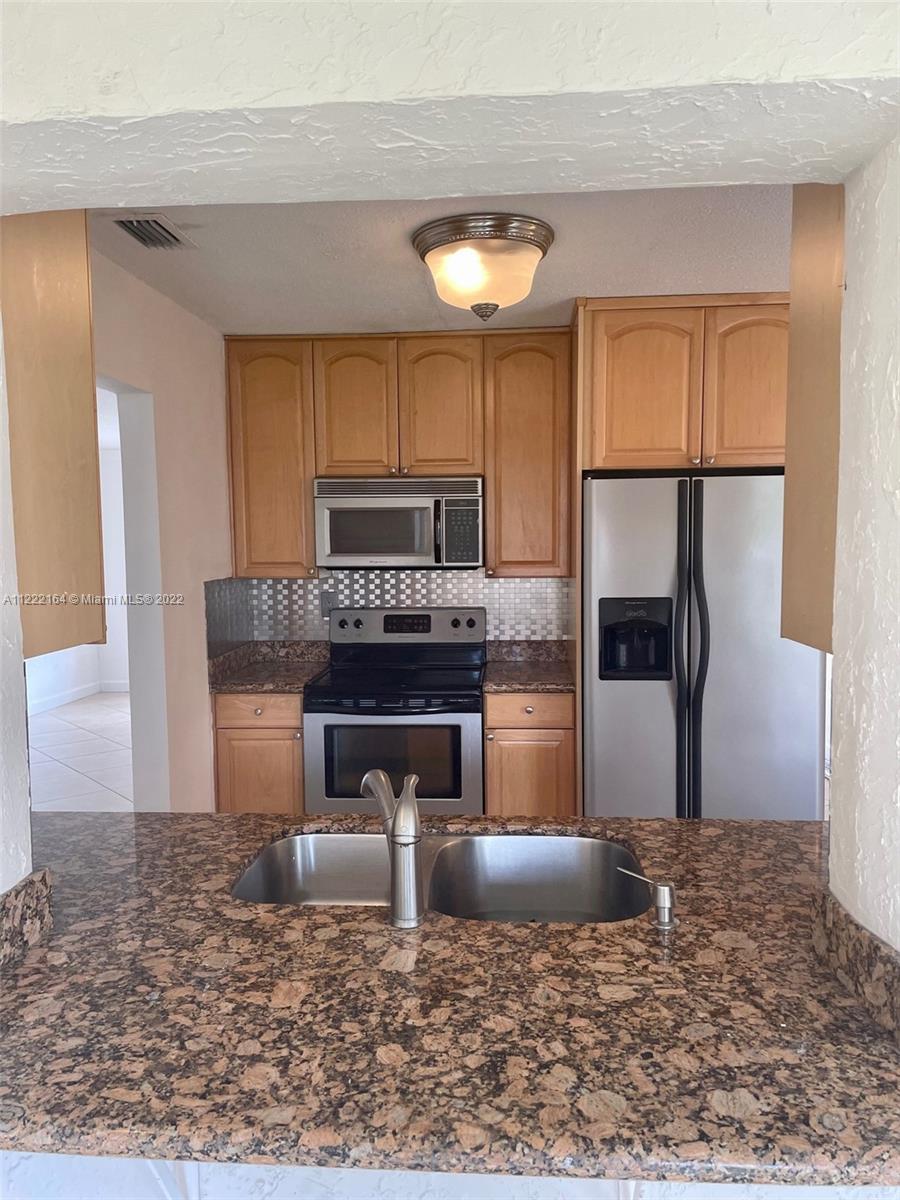 9607 NW 66th St Unit: 0