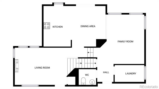 Floor plan showing the kitchen, dining area, family room, living room, hall, laundry room, and WC.