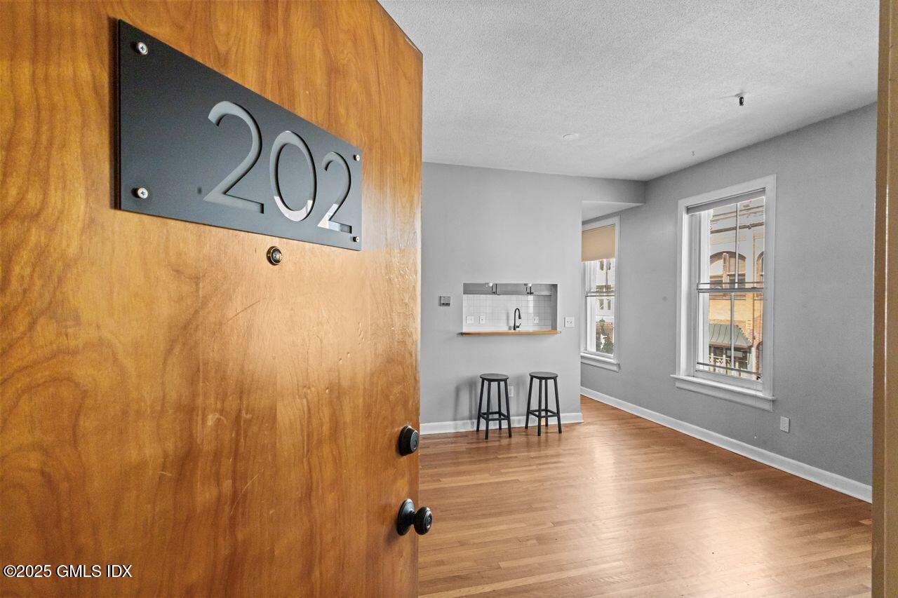 110 WASHINGTON Street, 202