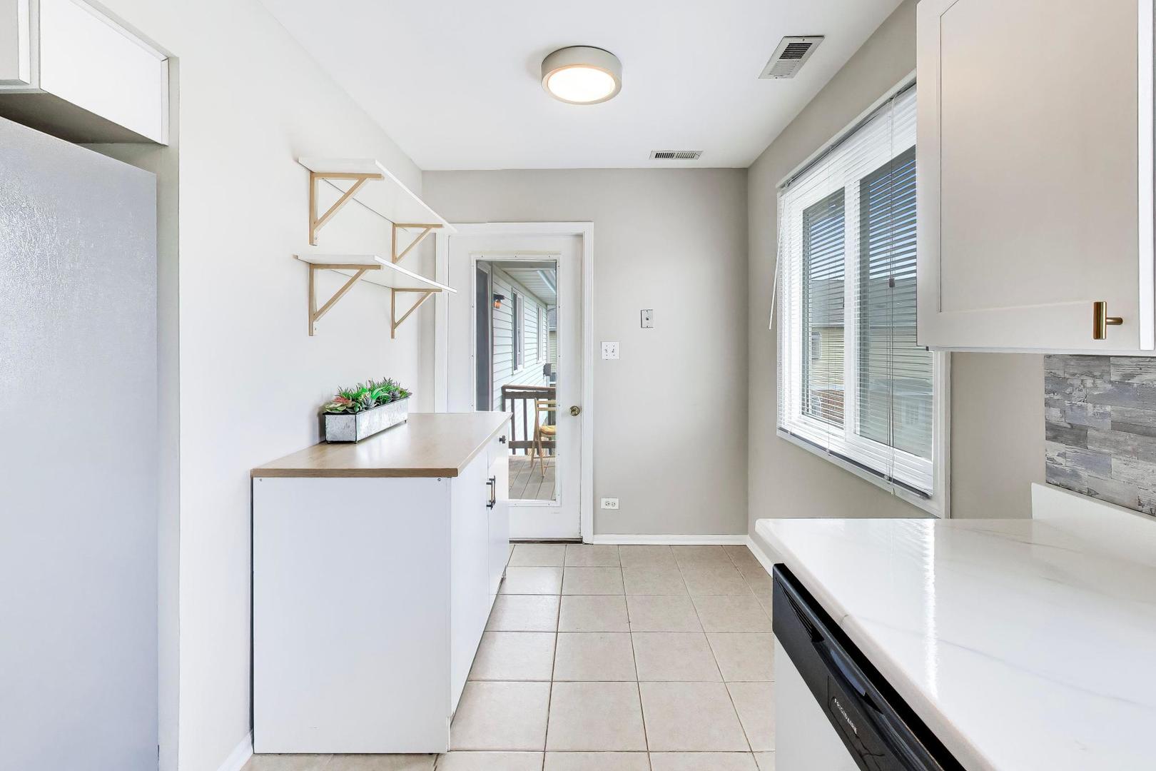 7230 S Adams Street Unit: D