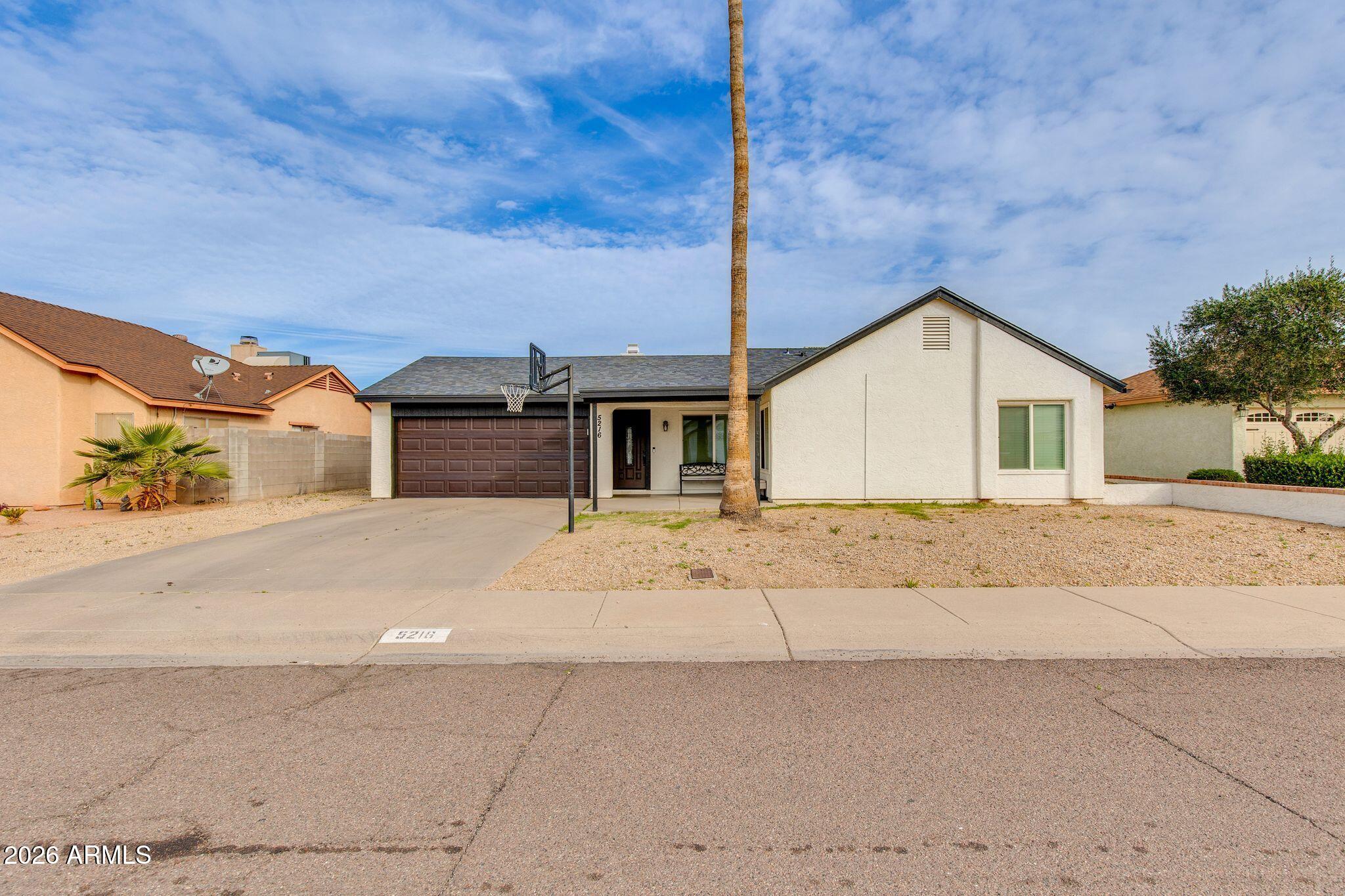 5216 W VOLTAIRE Drive