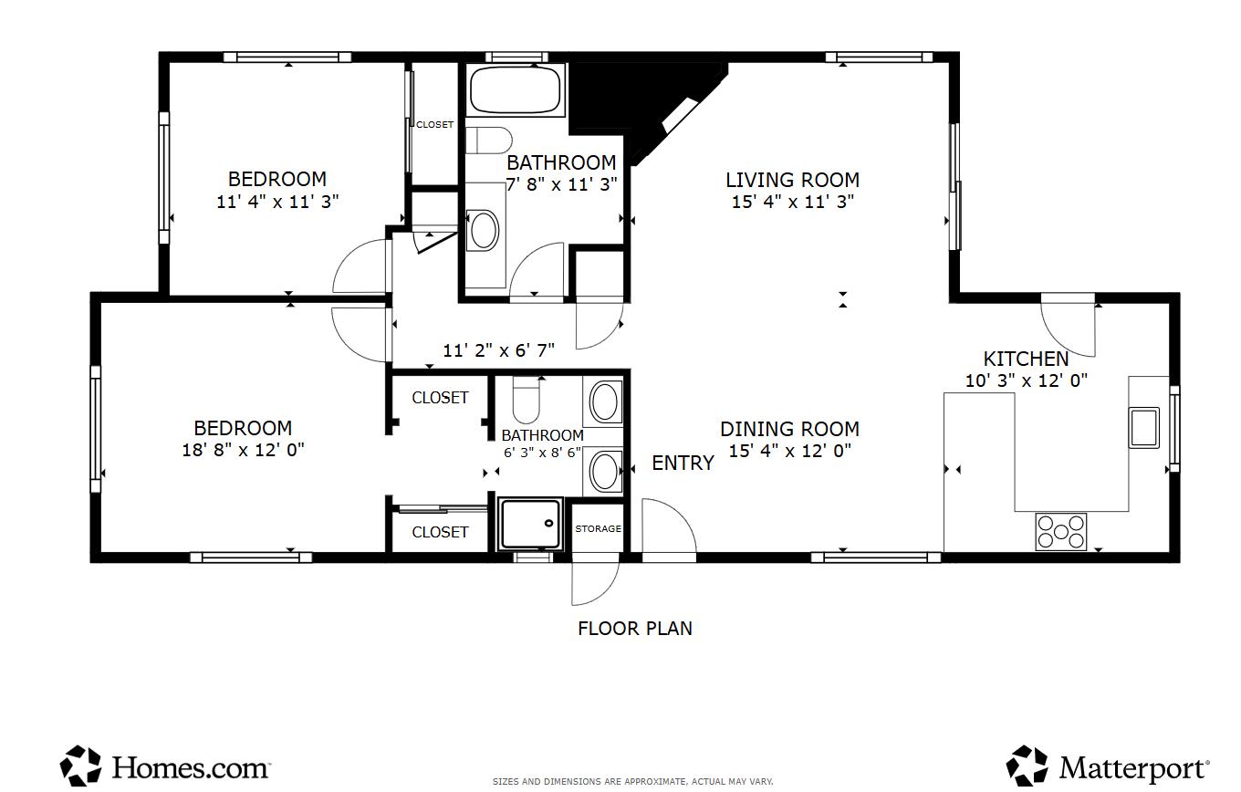 Floor plan showing two bedrooms, two bathrooms, and an open living, dining, and kitchen area.
