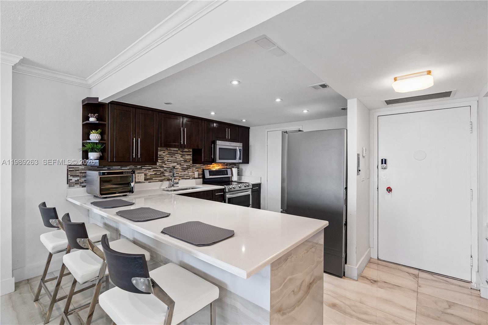 437 Golden Isles Dr # 11J