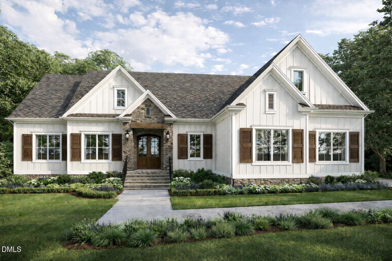 White gabled house with dark shutters, a stone entry, and landscaped beds along the front walkway.