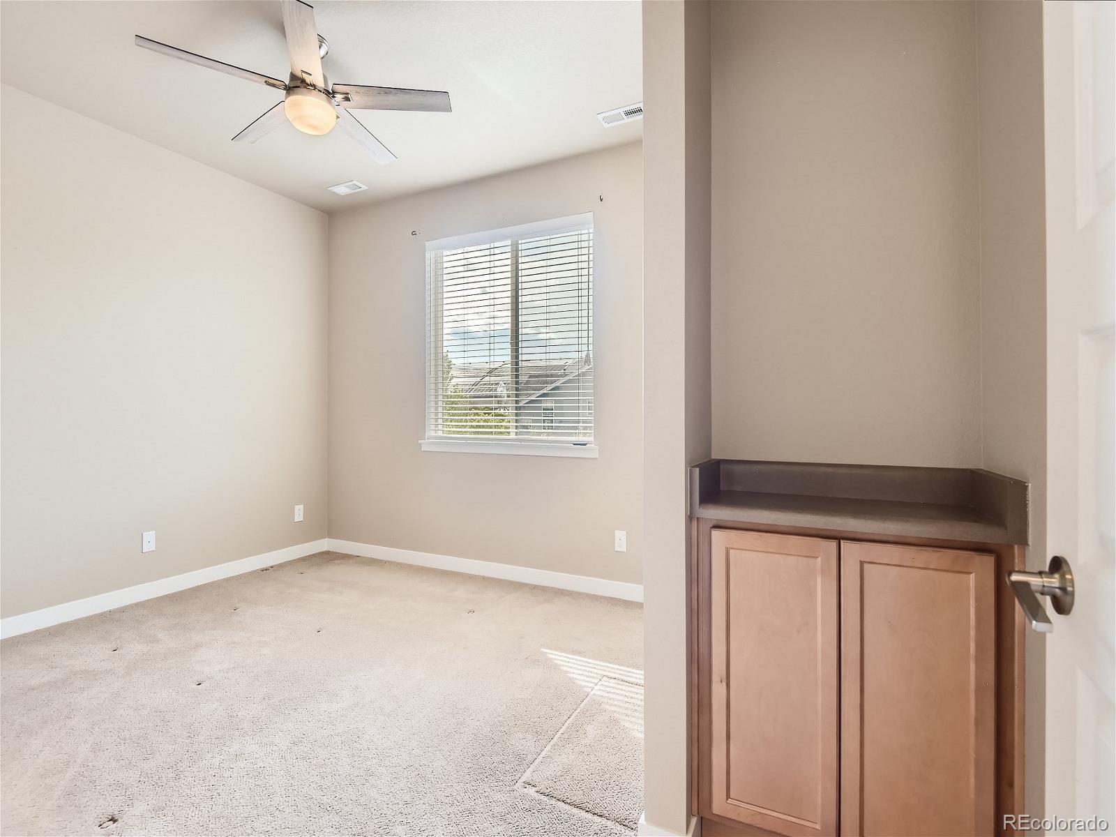 7718 E Academy Place