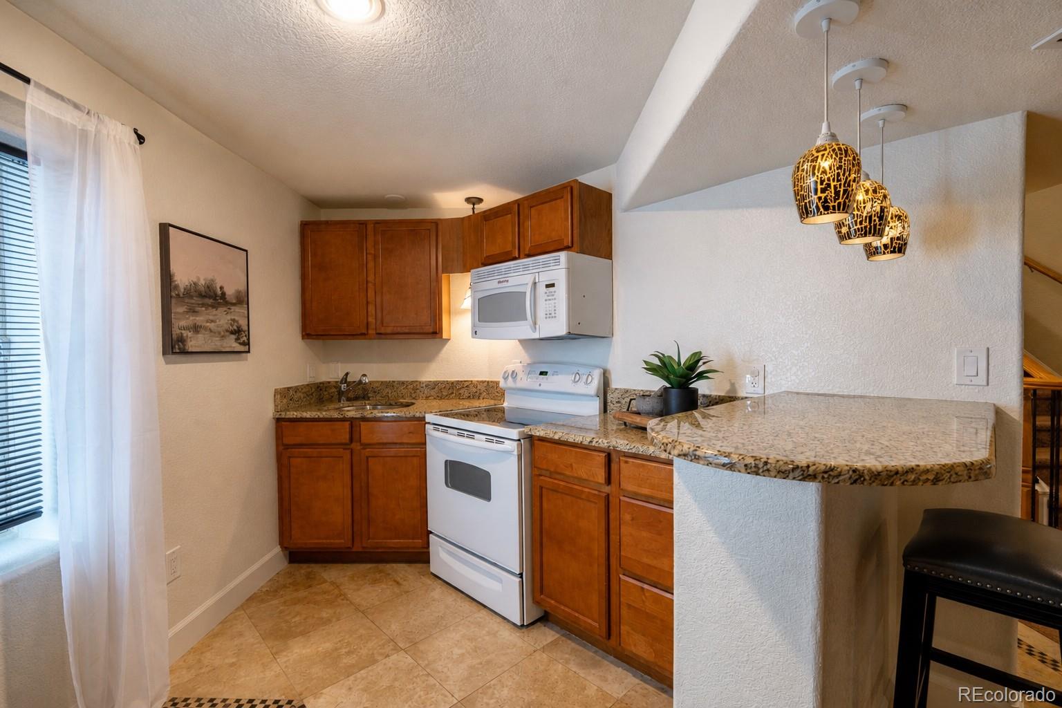 5667 W Green Meadows Place