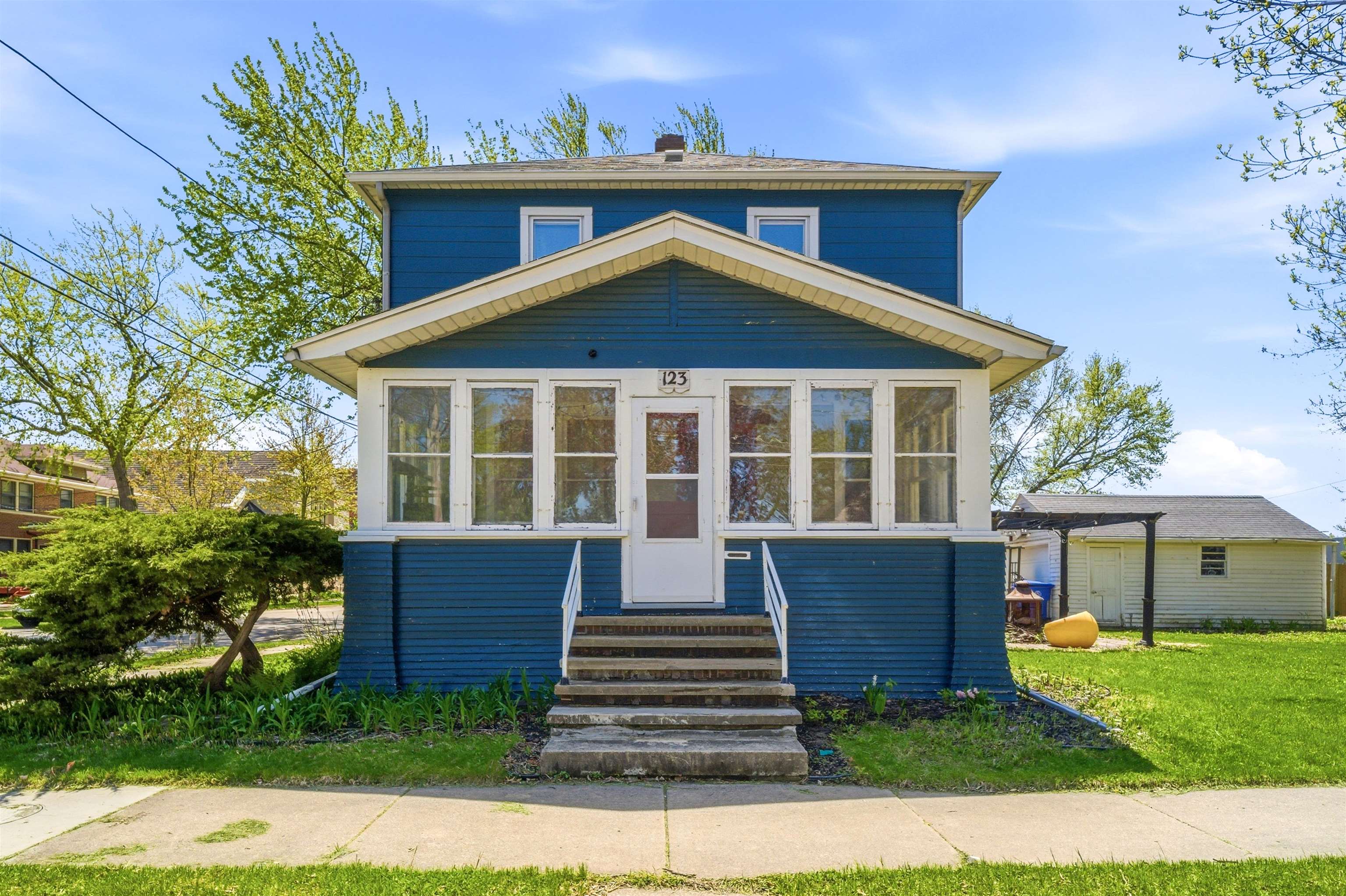 123 E HARRISON Street