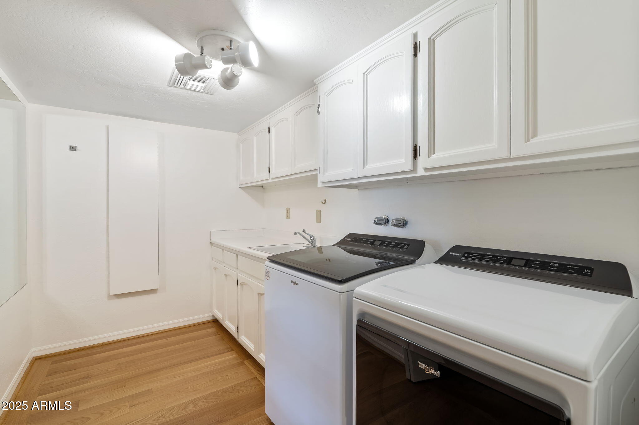 211 W KALER Drive