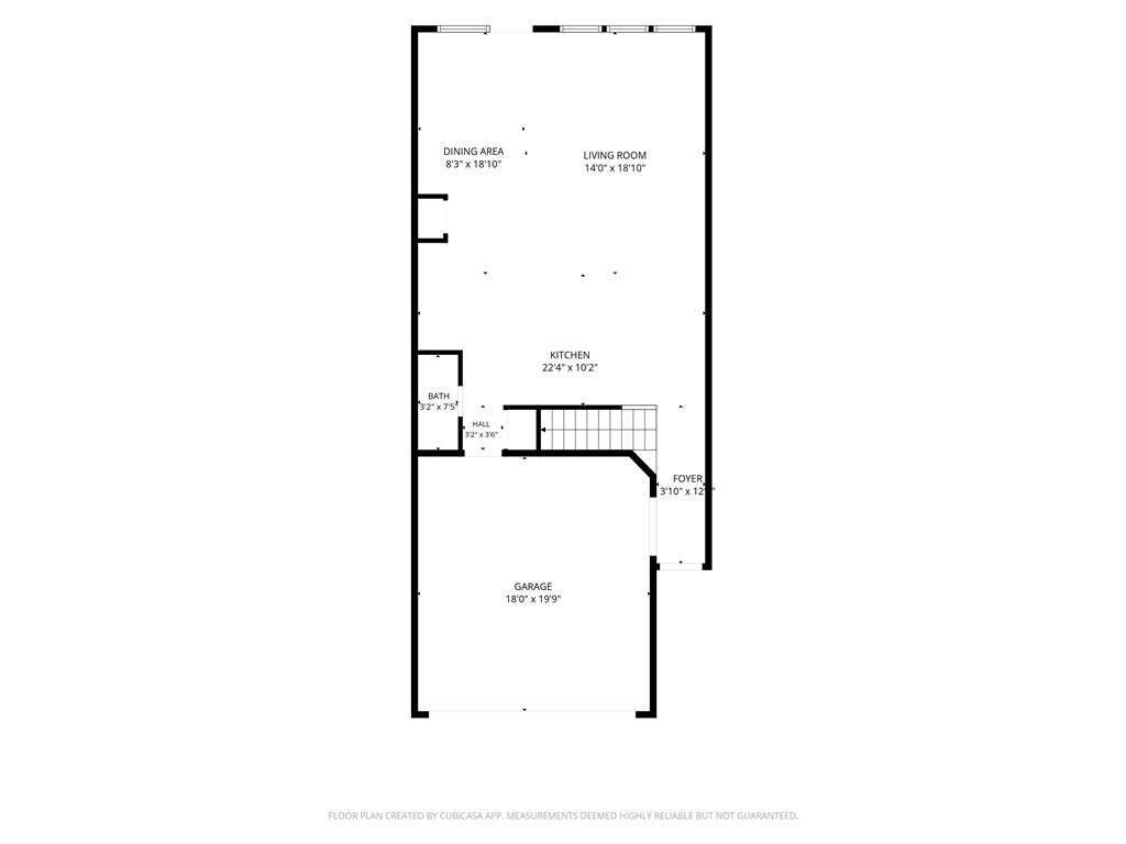 Floor plan showing dining area, living room, kitchen, bath, foyer, and garage.