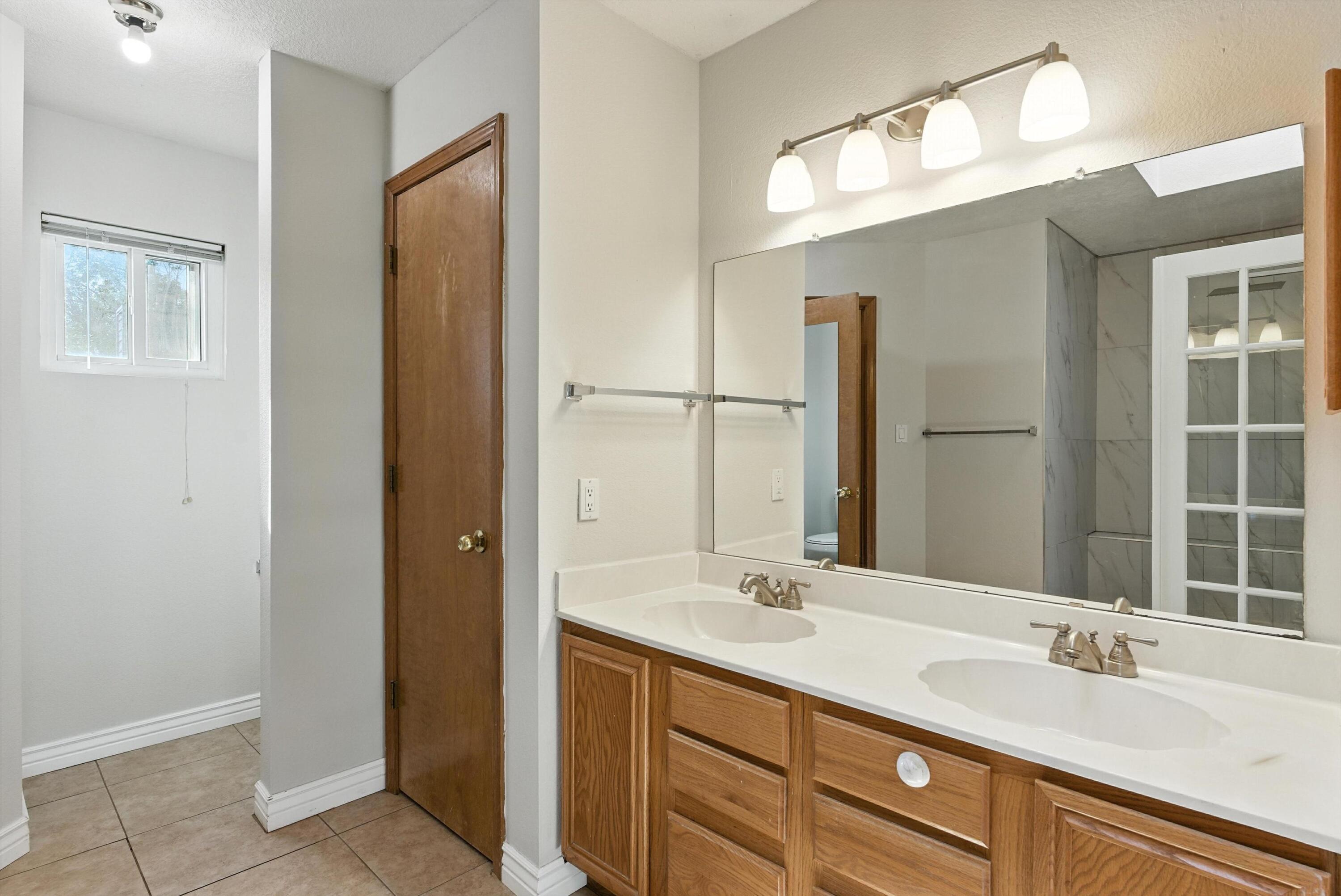 7816 BURSERA Drive NW