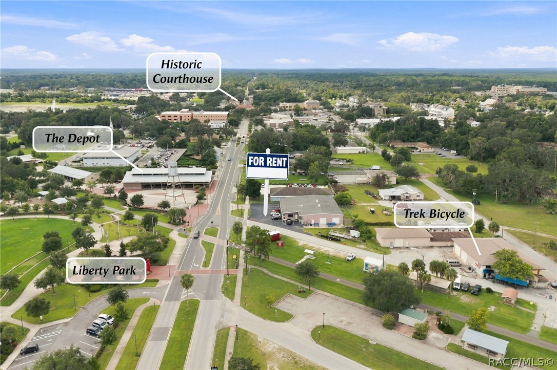 Aerial view of a town with labels for the courthouse, depot, Liberty Park, and Trek Bicycle.