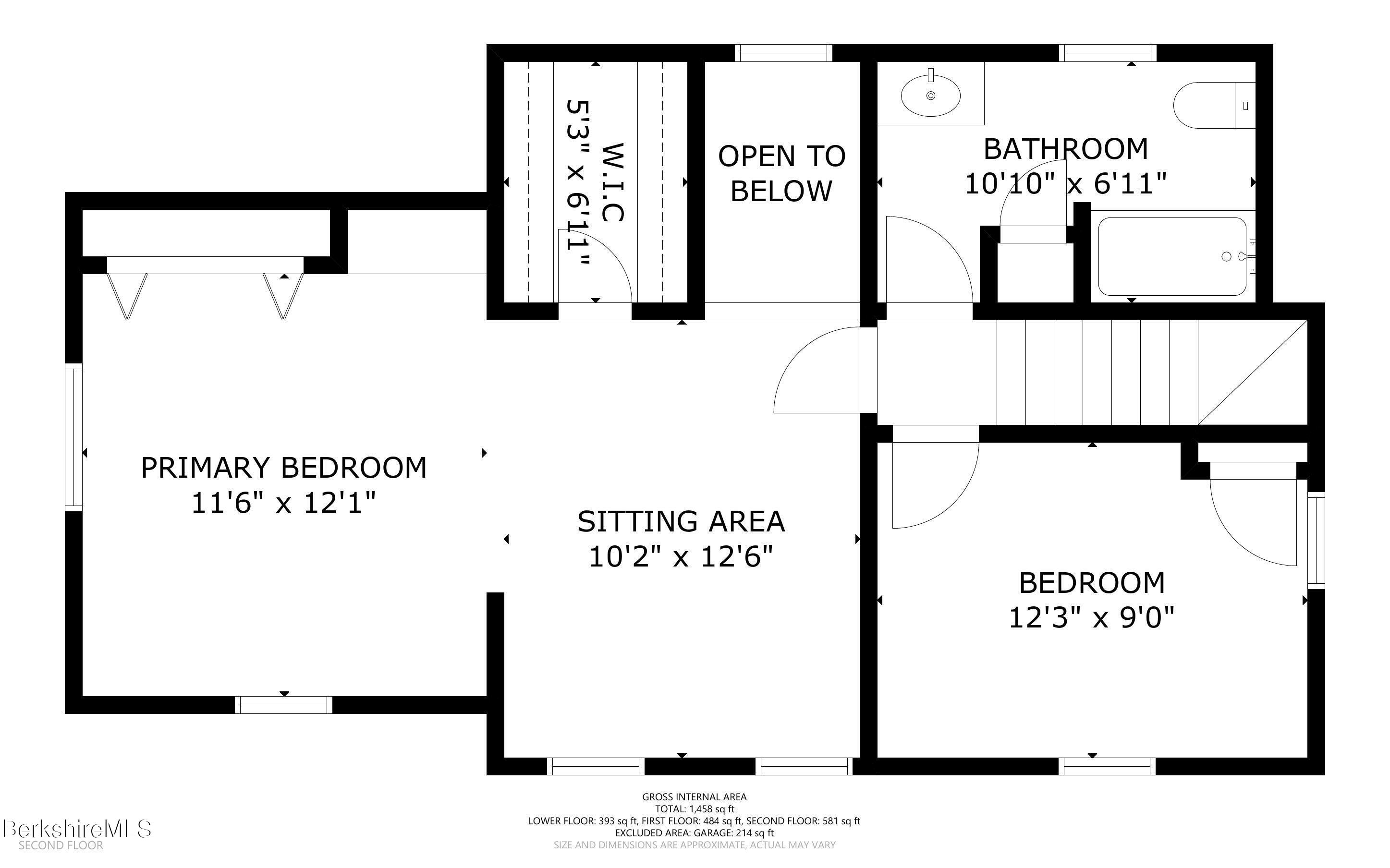 Second-floor plan showing a primary bedroom, sitting area, second bedroom, bathroom, and open-to-below space.