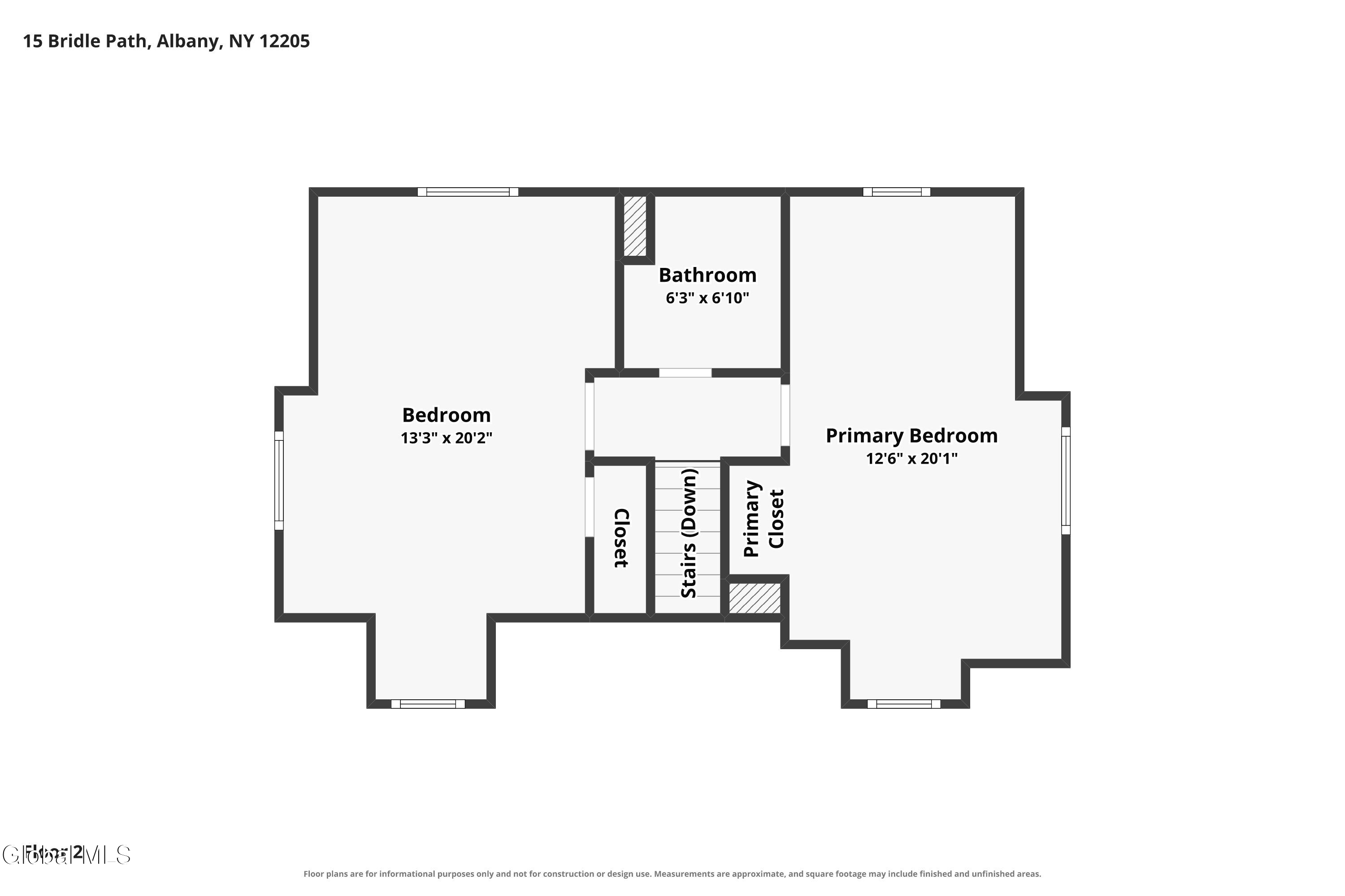 Floor plan showing a bedroom, primary bedroom, bathroom, closets, and stairs.