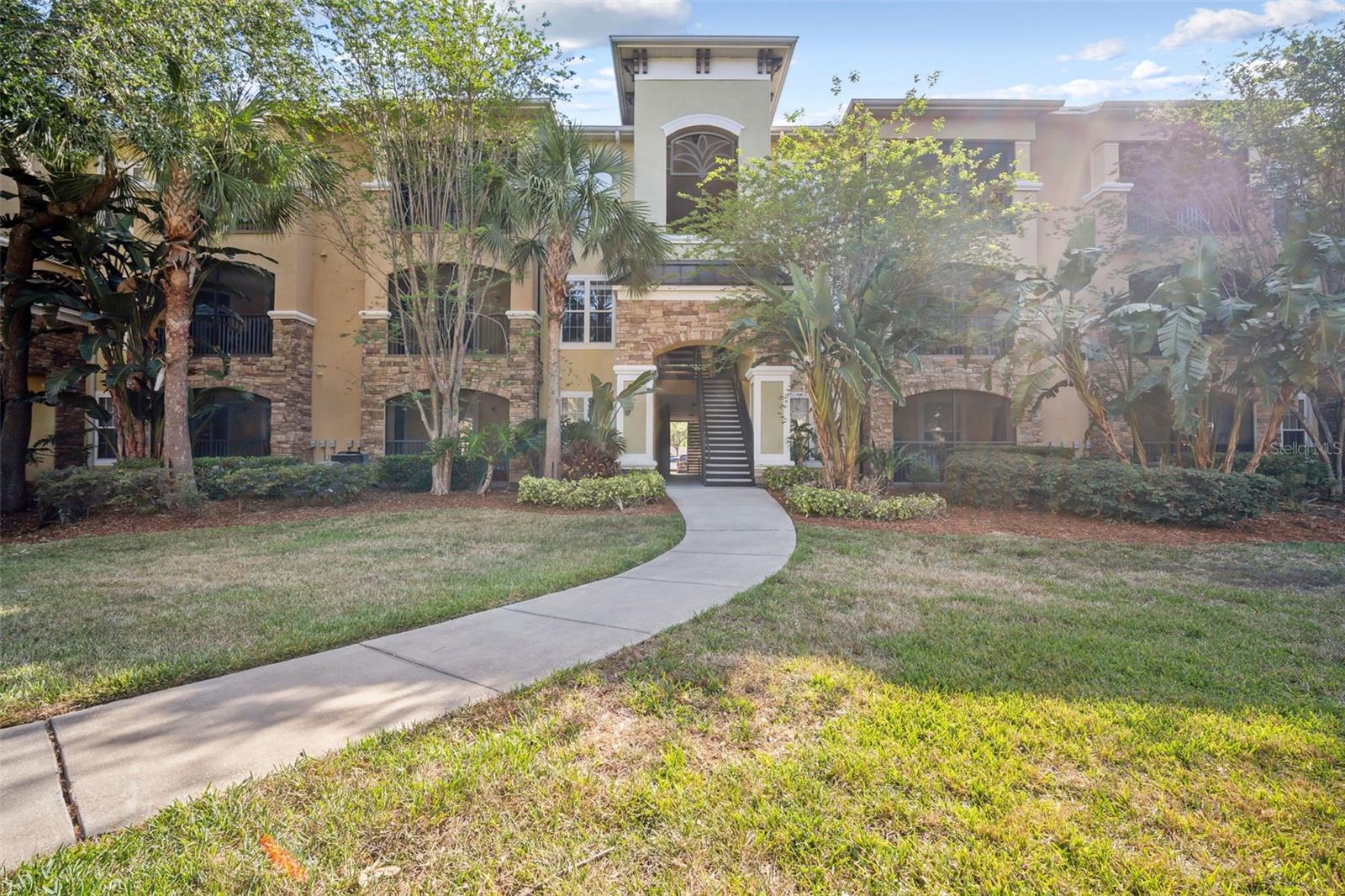 10019 COURTNEY PALMS BLVD #203