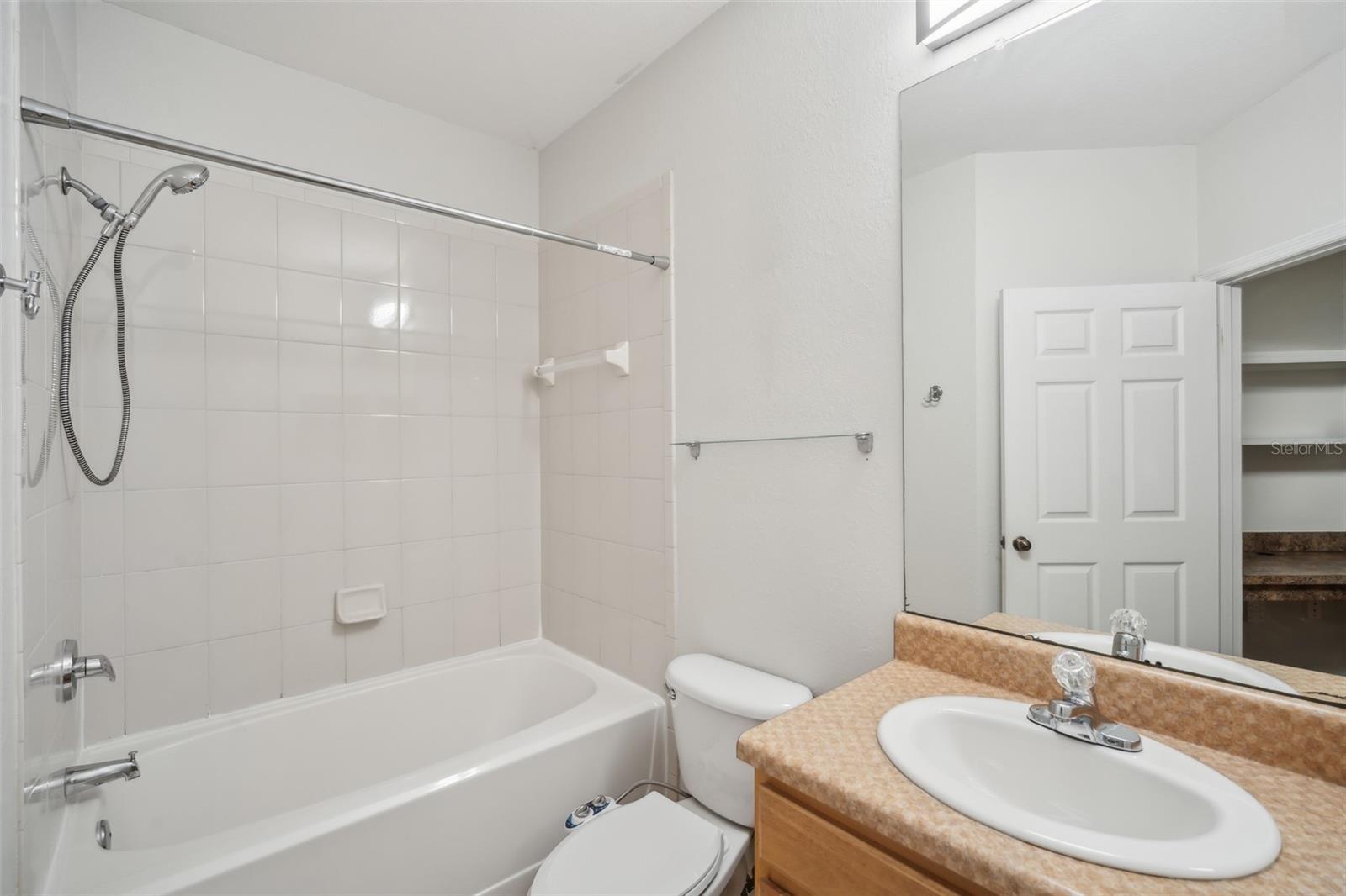 10019 COURTNEY PALMS BLVD #203