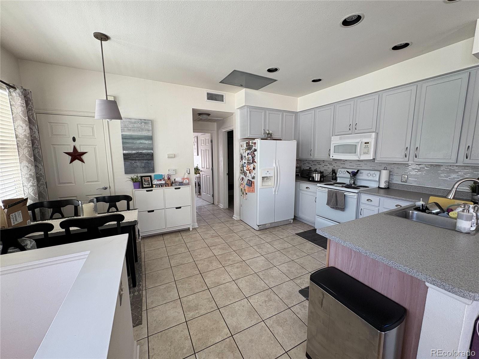 7454 E 28th Avenue Unit: 3