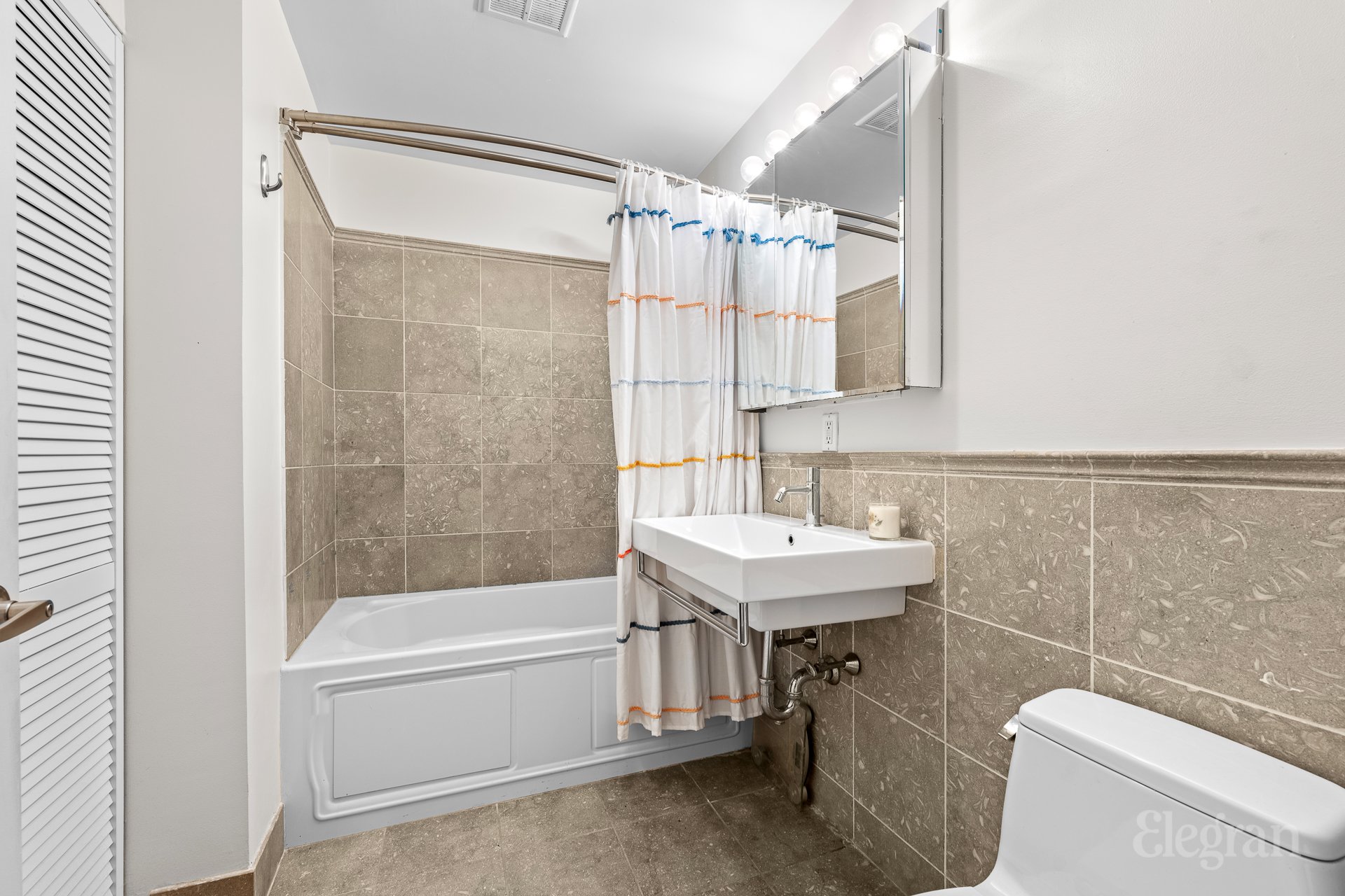 11 W 131st Street 1-C